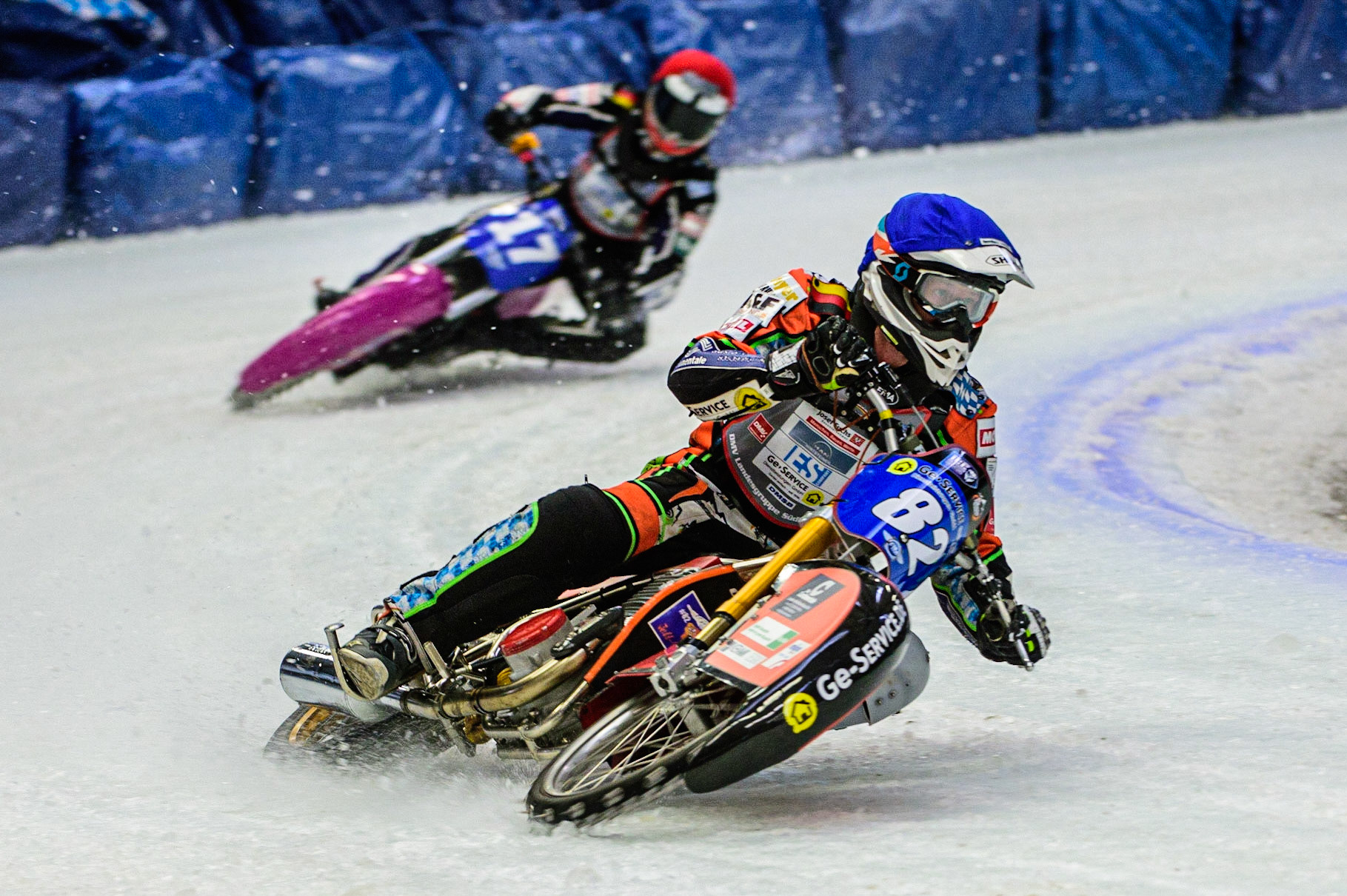 Markus Jell (82) (Blue) leads Benedikt Monn (17) (Red) during the Ice Speedway Gladiators World Championship Final 2 at Max-Aicher-Arena, Inzell, Germany on Sunday 19th March 2023. (Photo: Ian Charles | MI News)