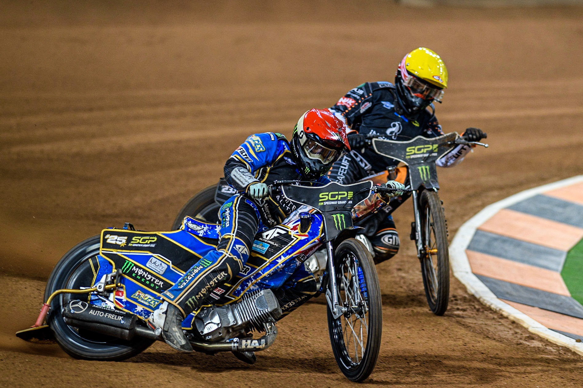 Jack Holder (25) (Red) leads  Kim Nilsson (233) (Yellow) during the FIM Speedway Grand Prix of Great Britain at the Principality Stadium, Cardiff on Saturday 2nd September 2023. (Photo: Ian Charles | MI News)