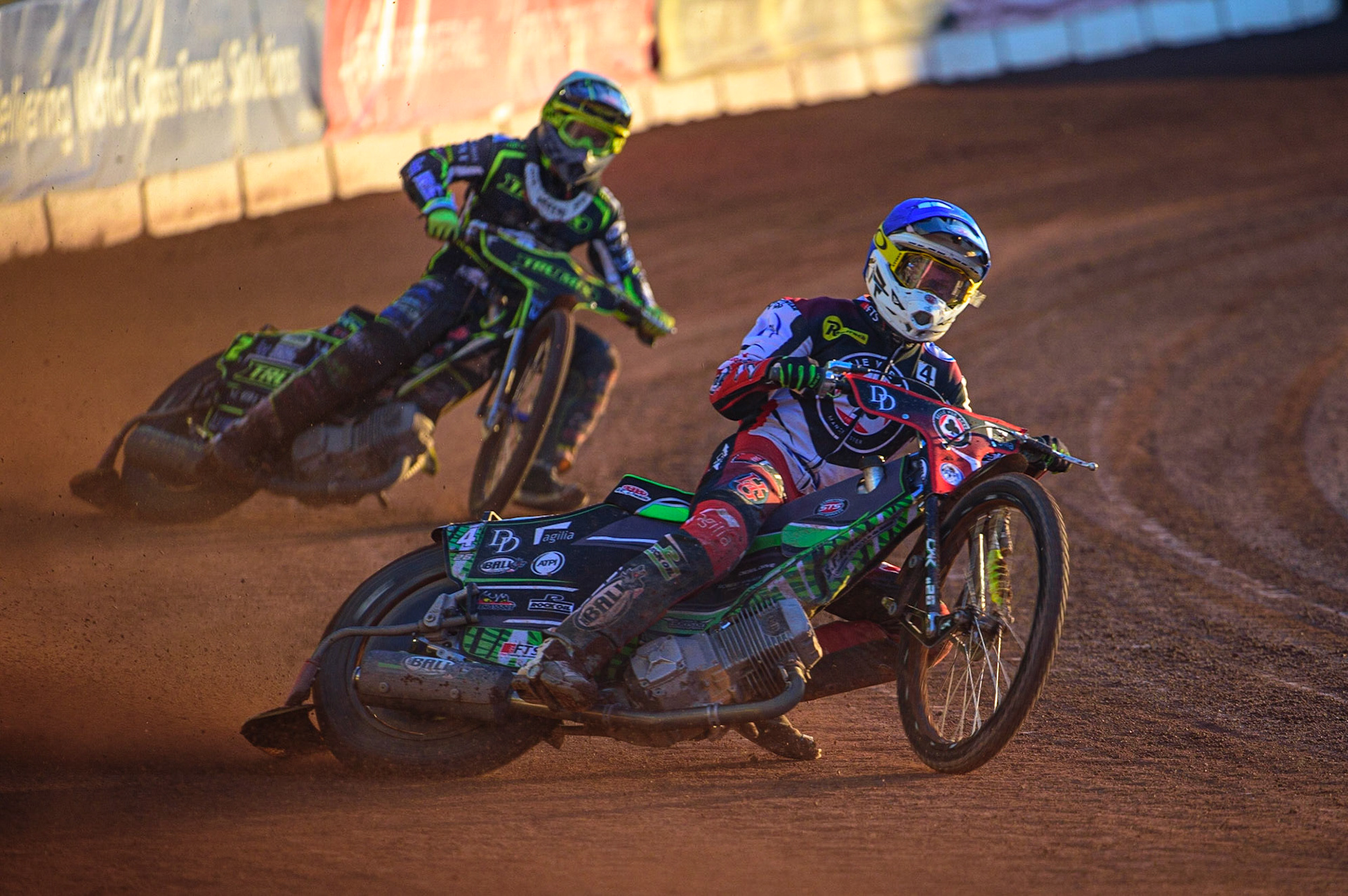 Charles Wright  (Blue) leads Paul Starke  (Yellow) during the SGB Premiership match between Belle Vue Aces and Ipswich Witches at the National Speedway Stadium, Manchester on Monday 8th August 2022. (Credit: Ian Charles | MI News)