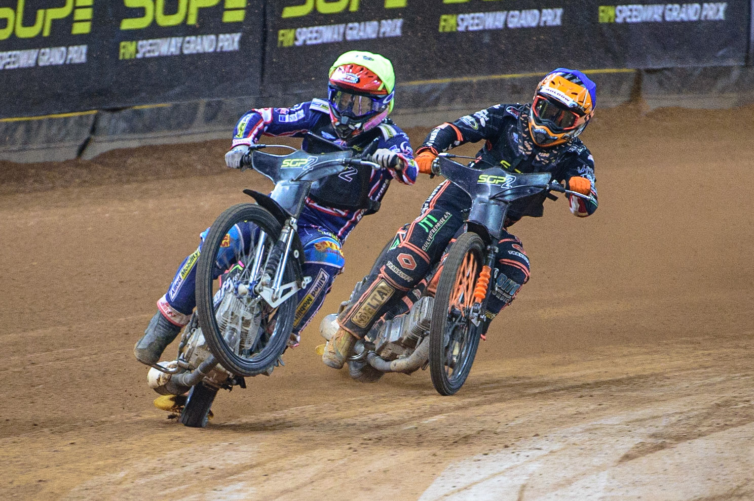 Leon Flint (Great Britain)  (Yellow) picks up some drive coming out of the corner ahead of Kevin Juhl Pedersen (Denmark) (Blue) during the FIM  Speedway Grand Prix  2 of Great Britain at the Principality Stadium, Cardiff on Sunday 14th August 2022. (Credit: Ian Charles | MI News)