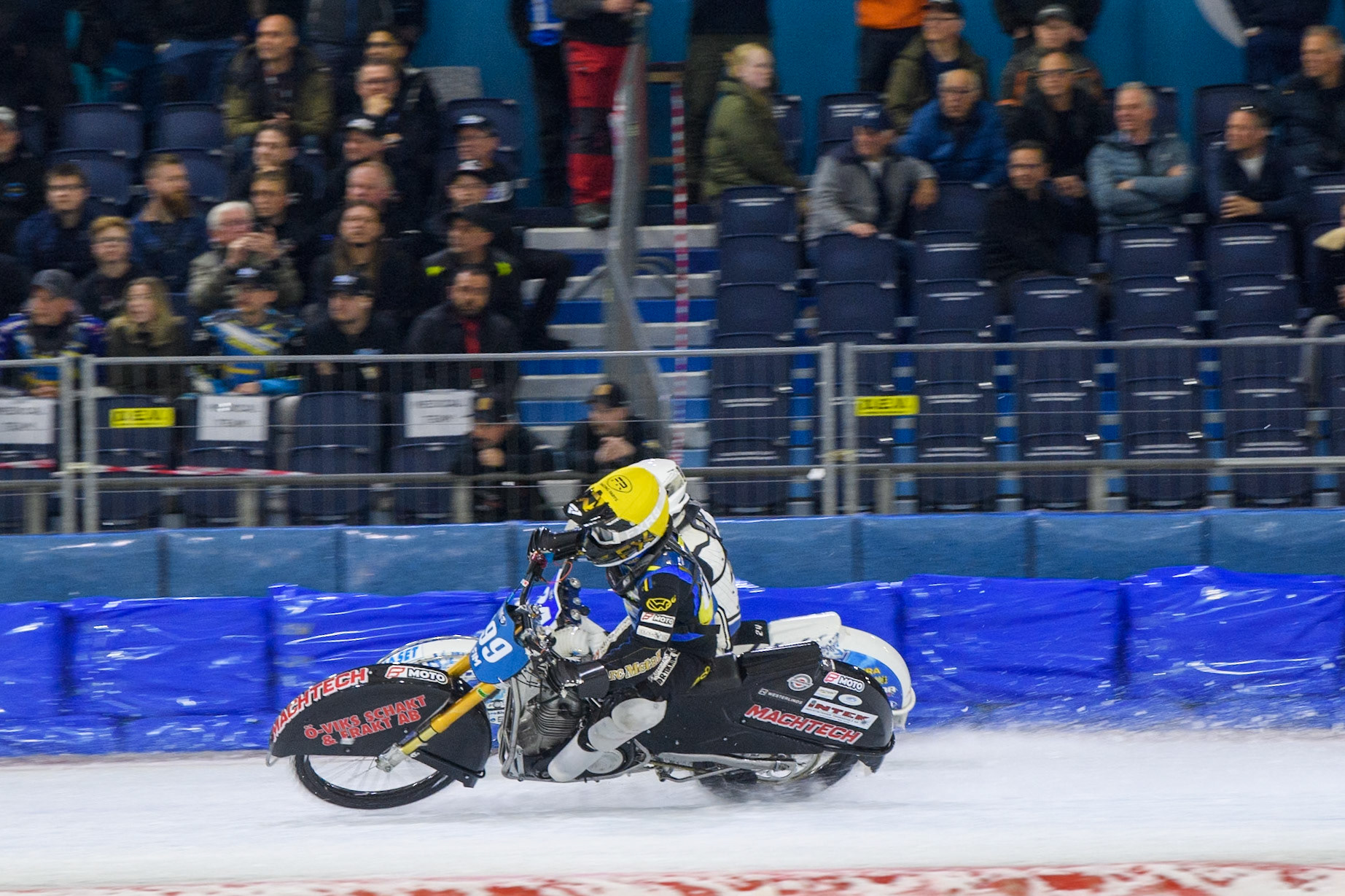 Martin Haarahiltunen (199) of Sweden in Yellow rides inside Max Koivula (24) of Finland in White during the FIM Ice Speedway Gladiators World Championship, Final 3 at the Ice Stadium, Thialf, Heerenveen on Saturday 5th April 2025. (Photo: Ian Charles | MI News)