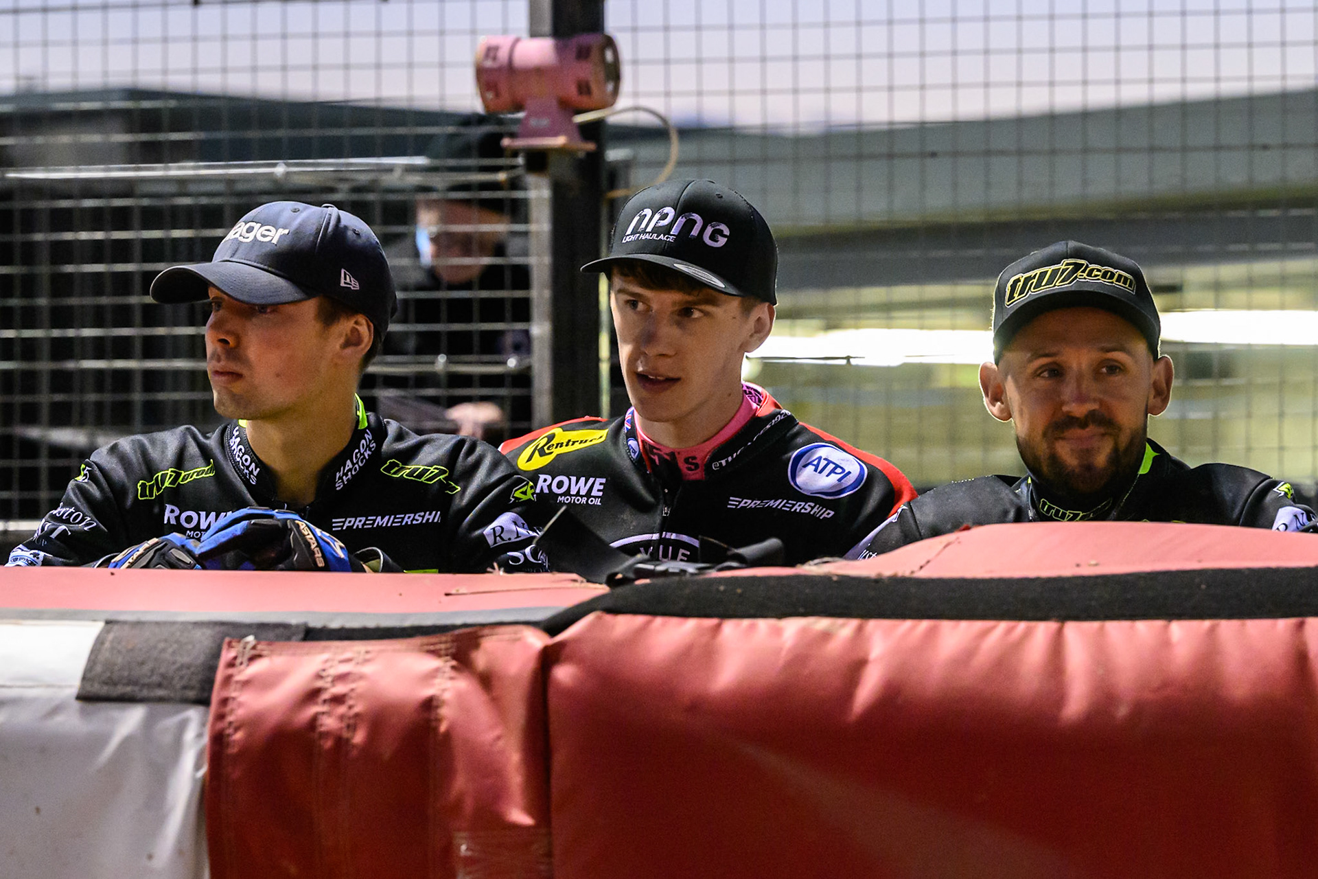 (L to R) Jason Edwards of Ipswich Witches , Jake Mulford of Belle Vue Aces  and Danny King of Ipswich Witches  watch the track prep during the Rowe Motor Oil Premiership match between Belle Vue Aces and Ipswich Witches at the National Speedway Stadium, Manchester on Monday 4th August 2025. (Photo: Ian Charles | MI News)
