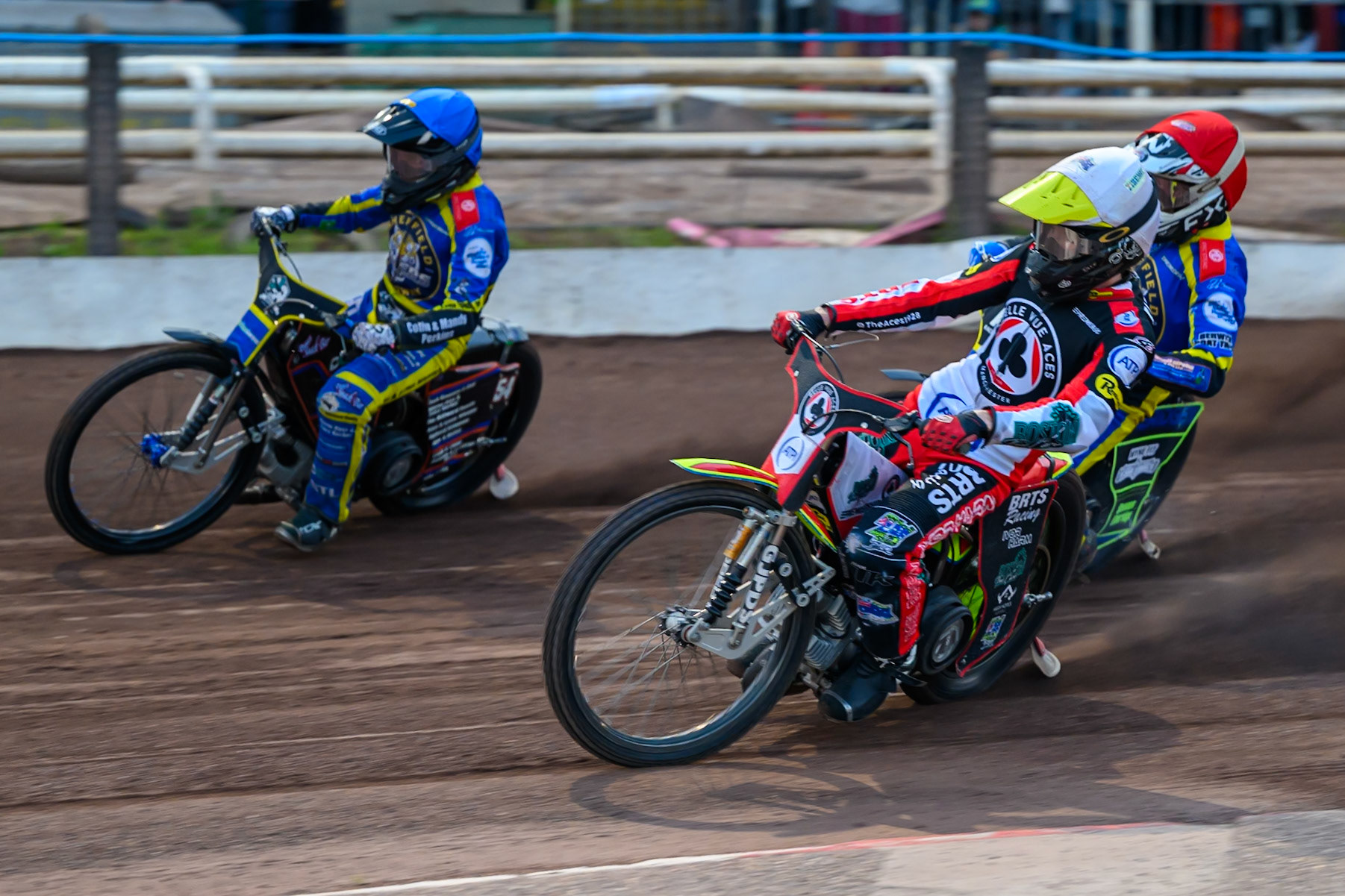 Tate Zischke of Belle Vue Aces in White on the inside of Luke Killeen of Sheffield Tigers in Blue  and Jye Etheridge of Sheffield Tigers in Red during the Rowe Motor Oil Premiership match between Sheffield Tigers and Belle Vue Aces at Owlerton Stadium, Sheffield on Monday 31st August 2026. (Photo: Ian Charles | MI News)