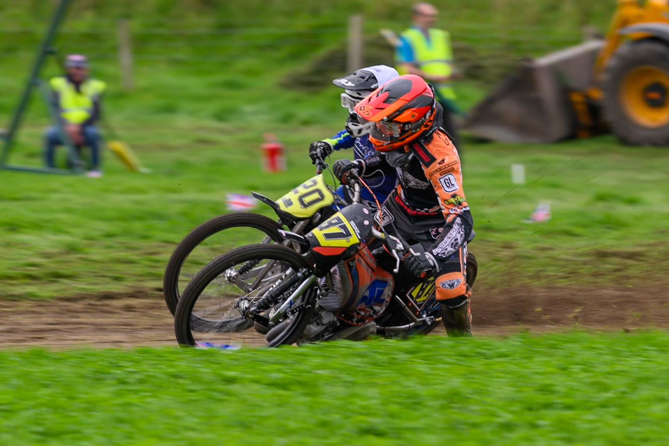 British Masters (Solos): Mickie Simpson (87) on the inside of Arran Butcher (20) during the British Masters Grasstrack Championship at Lower Marsh Farm, Much Hoole, Preston in Lancashire, England on Sunday 13th September 2026. (Photo: Ian Charles | MI News)