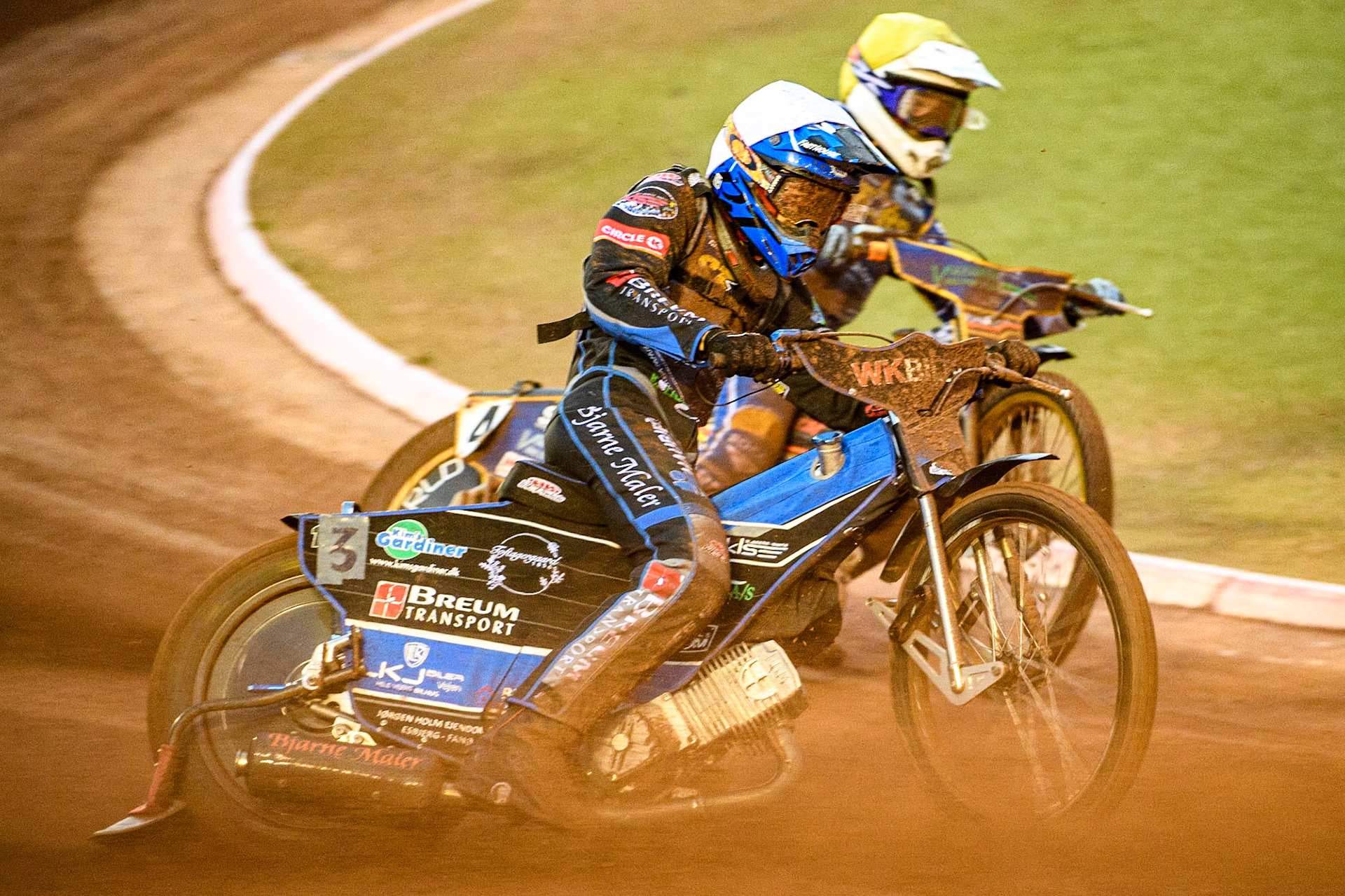Emil Breum  (White) outside team mate Connor Mountain (Yellow) during the Sports Insure Premiership match between Belle Vue Aces and King's Lynn Stars at the National Speedway Stadium, Manchester on Monday 21st August 2023. (Photo: Ian Charles | MI News)