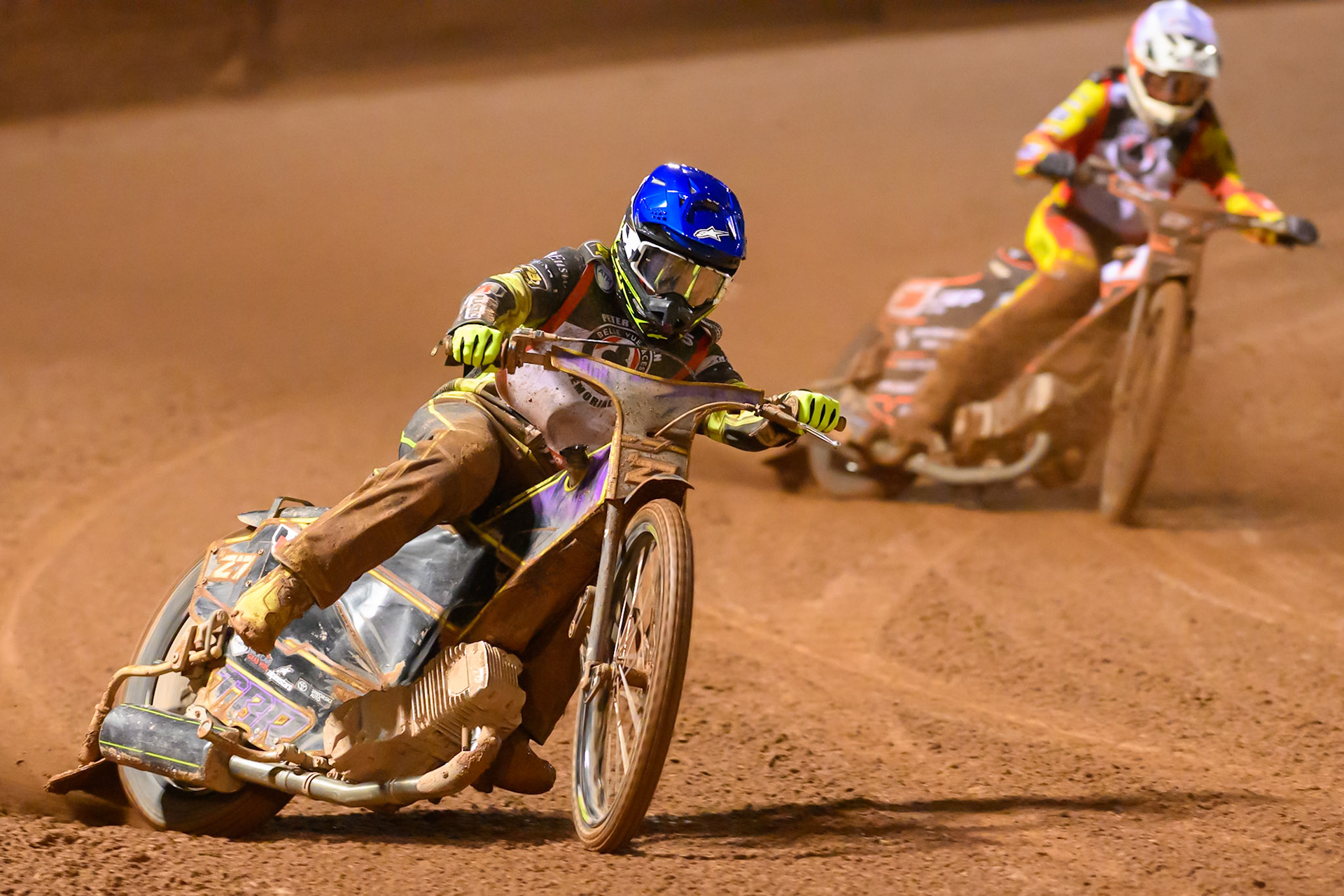 Tom Brennan  in Blue leading Sam Masters in White during the Peter Craven Memorial Trophy at the National Speedway Stadium, Manchester, on Monday 16th March 2026. (Photo: Ian Charles | MI News)