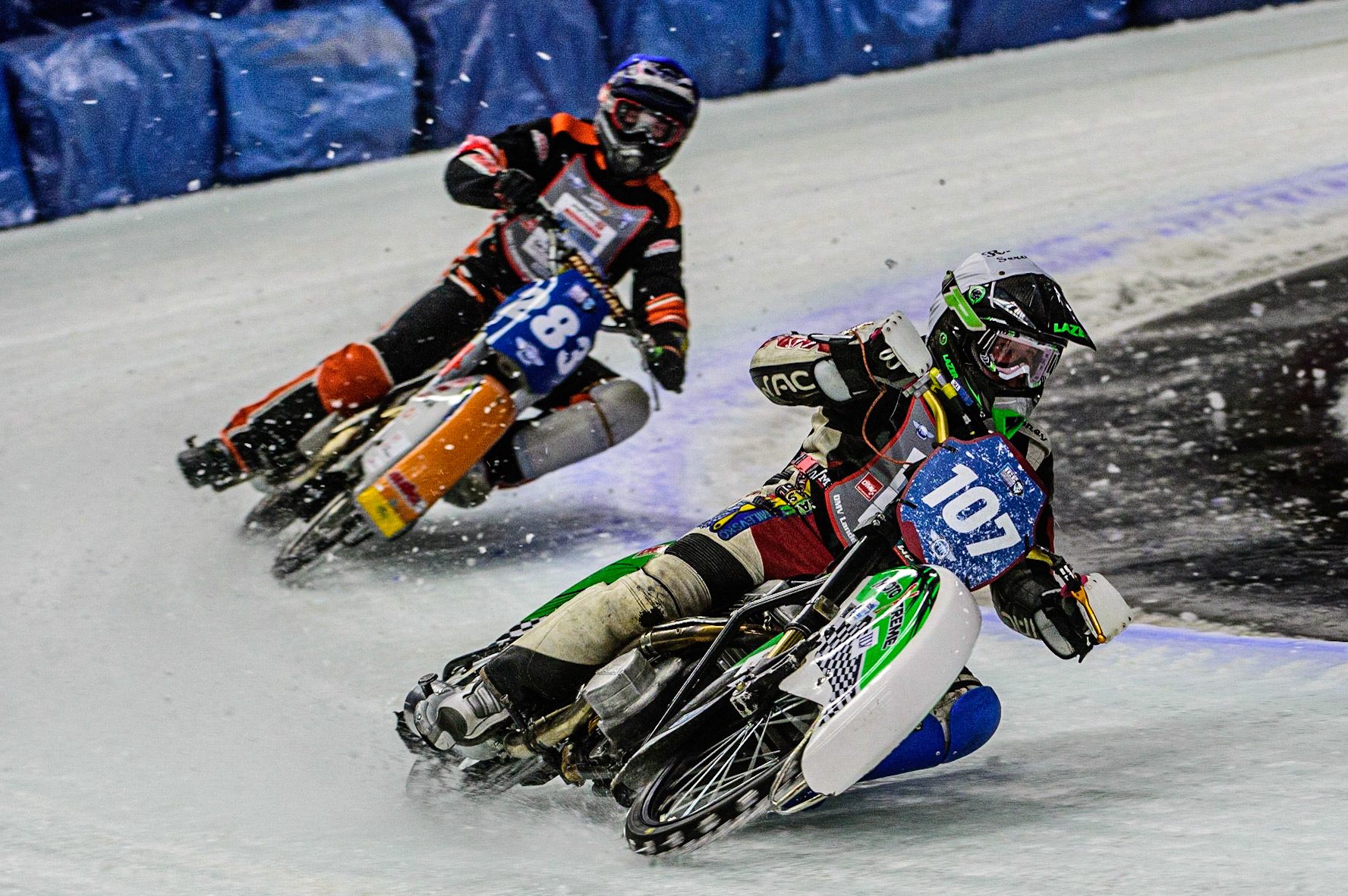 Andrej Divis (107) (White) leads Sebastian Reitsma (283) (Blue) during the Ice Speedway Gladiators World Championship Final 1 at Max-Aicher-Arena, Inzell, Germany on Saturday 18th March 2023. (Photo: Ian Charles | MI News)