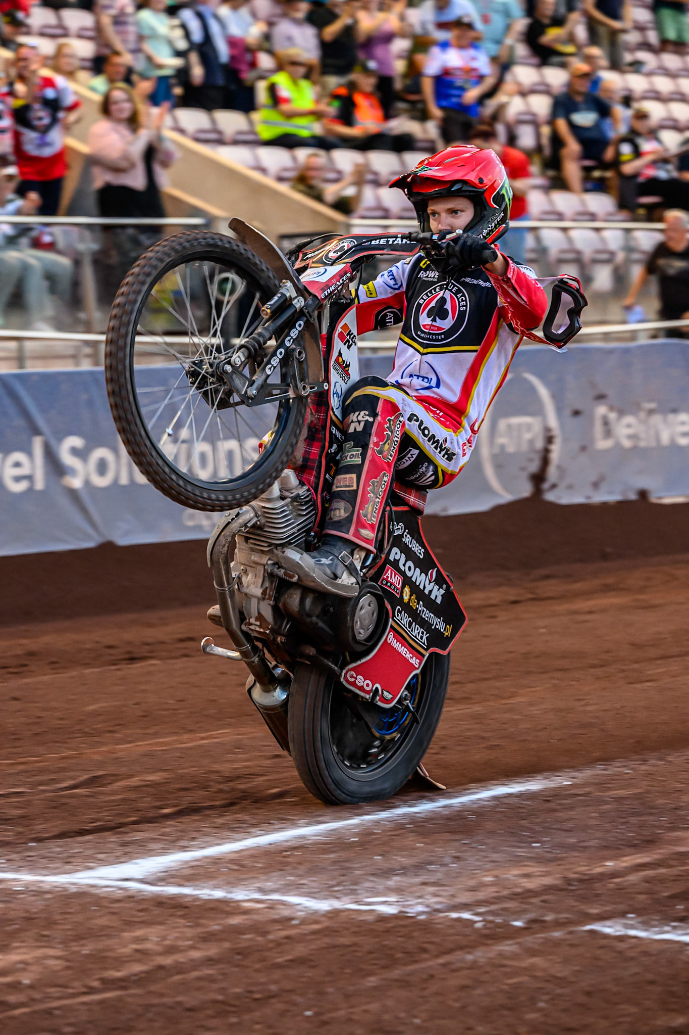 Belle Vue Aces' Dan Bewley celebrates with a wheelie during the Rowe Motor Oil Premiership match between Belle Vue Aces and Ipswich Witches at the National Speedway Stadium, Manchester on Monday 30th June 2025. (Photo: Ian Charles | MI News)