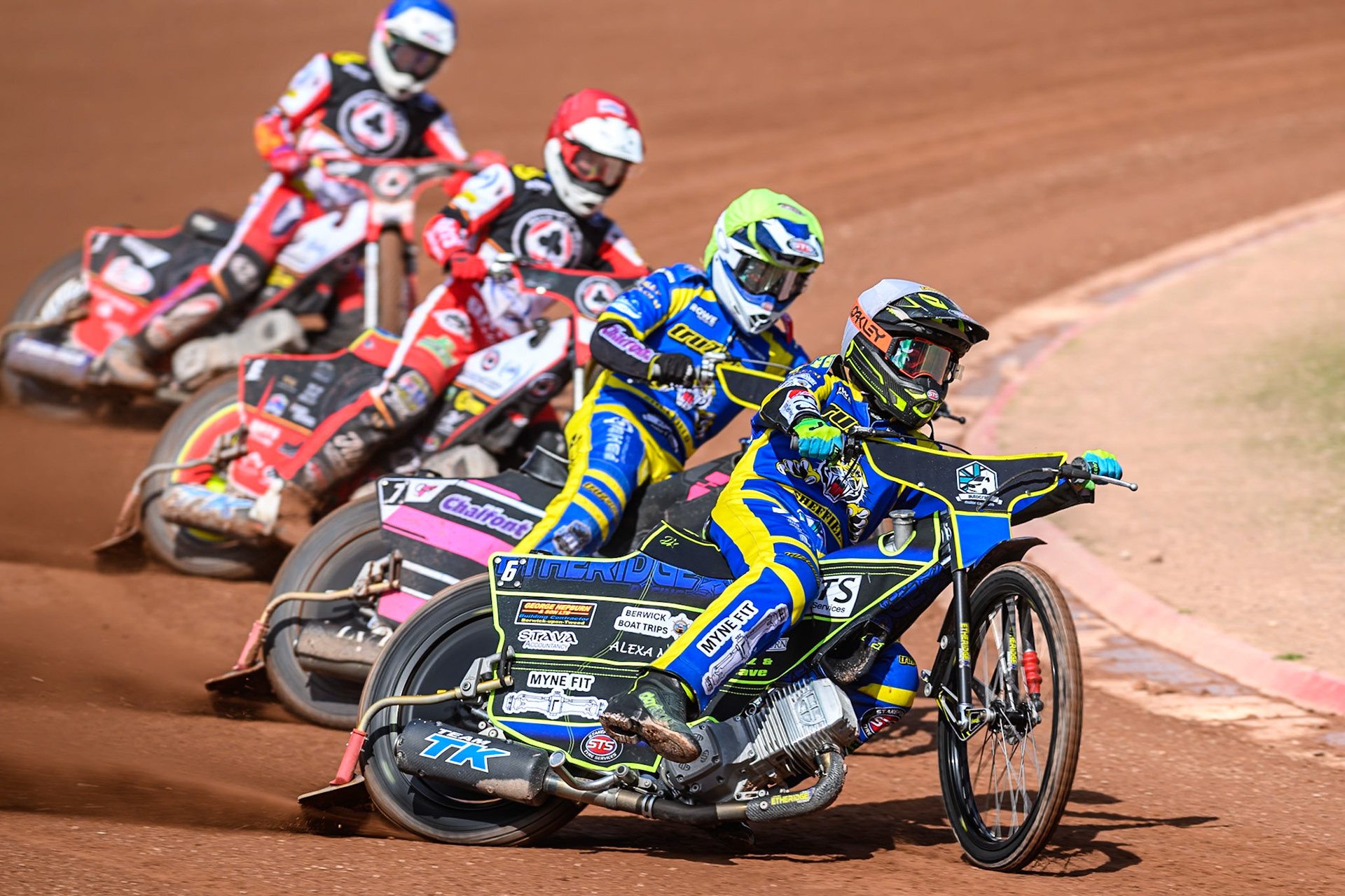 Jye Etheridge of Sheffield Tigers  in White leading Leon Flint of Sheffield Tigers  in Yellow, Tate Zischke of Belle Vue Aces  in Red and Jake Mulford of Belle Vue Aces  in Blue during the Rowe Motor Oil Premiership match between Belle Vue Aces and Sheffield Tigers at the National Speedway Stadium, Manchester on Monday 25th August 2025. (Photo: Ian Charles | MI News)