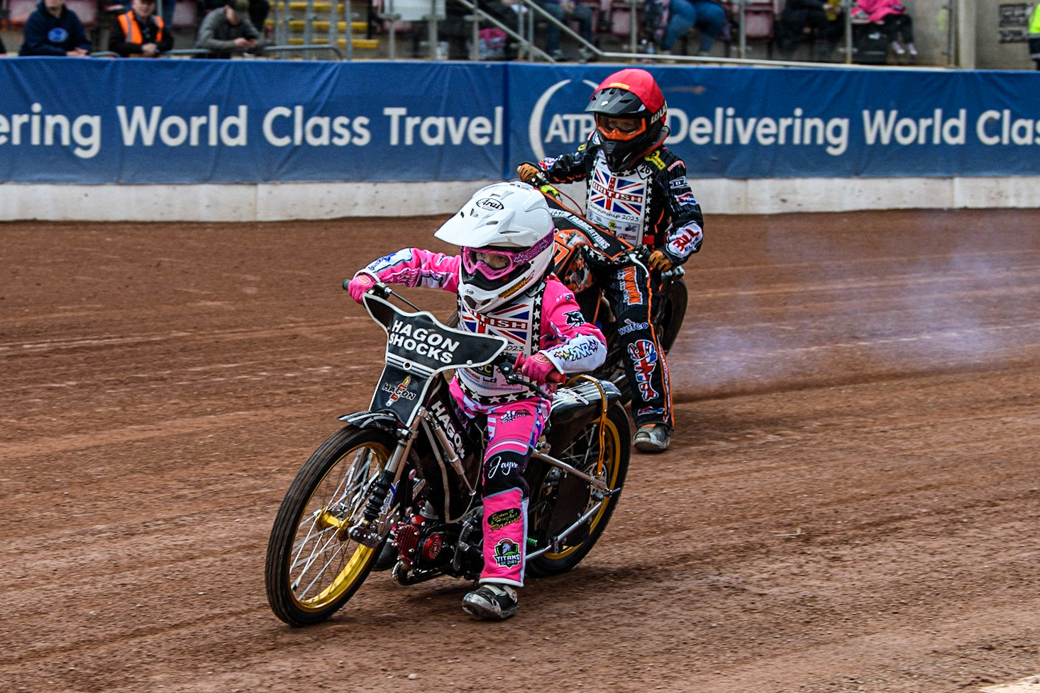 Jessica Cox  (White) leads Reuban Marsh  (Red) during the British Youth Championships at the National Speedway Stadium, Manchester on Friday 12th May 2023. (Photo: Ian Charles | MI News)