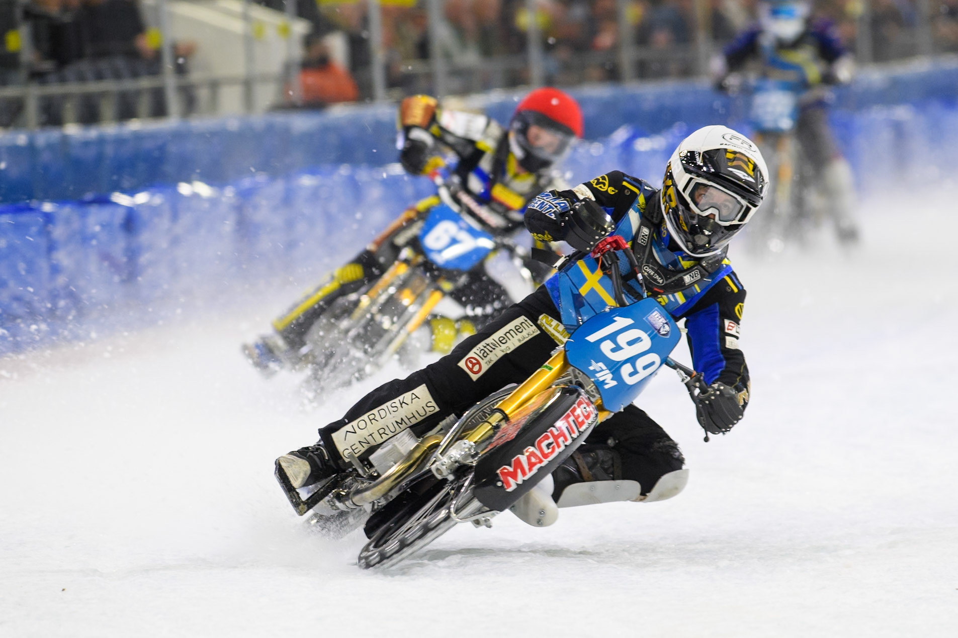 Martin Haarahiltunen (199) of Sweden in White leading Heikki Huusko (67) of Finland in Red during the FIM Ice Speedway Gladiators World Championship, Final 3 at the Ice Stadium, Thialf, Heerenveen on Saturday 5th April 2025. (Photo: Ian Charles | MI News)