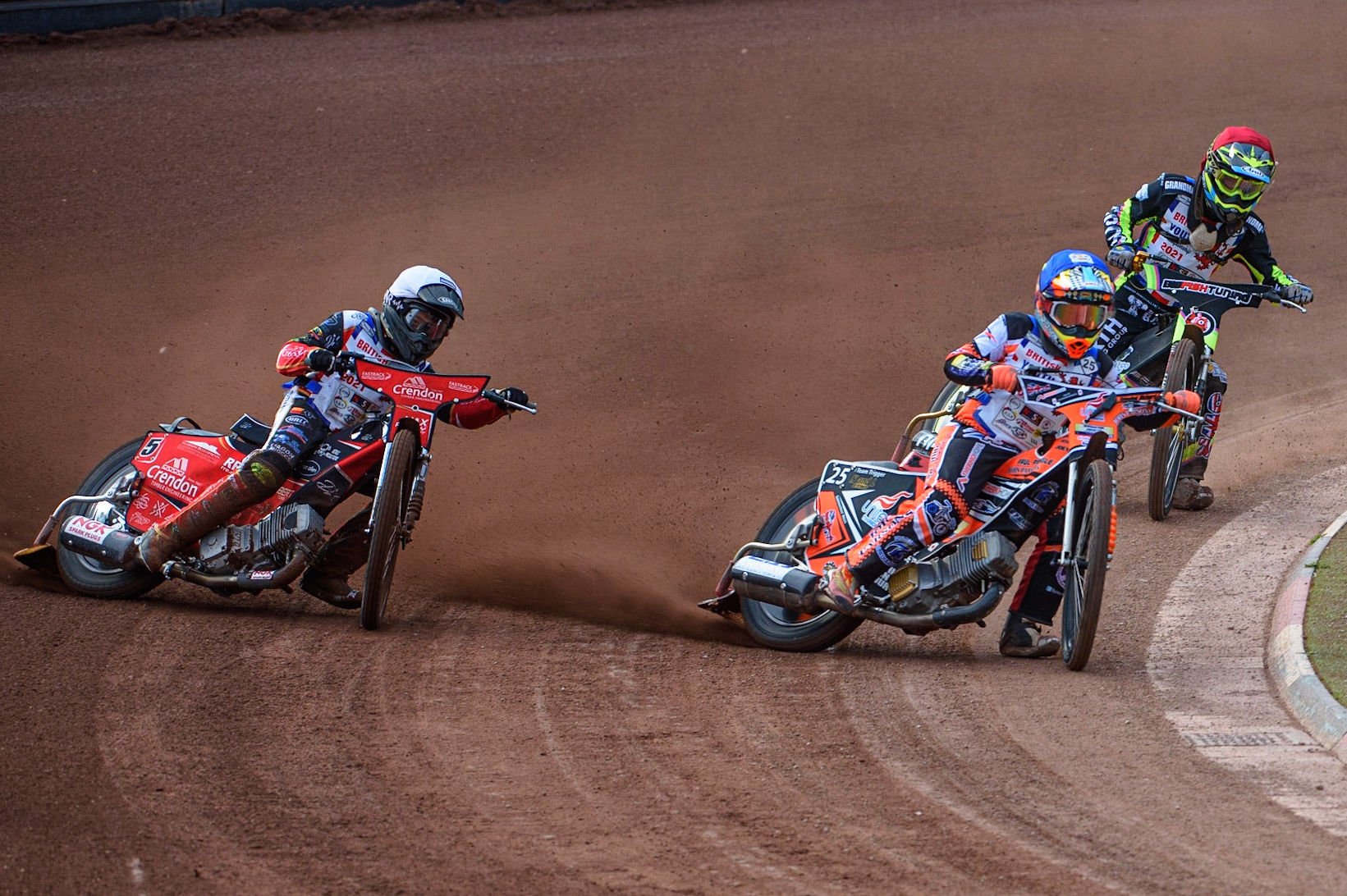 MANCHESTER, UK. MAY 28TH   Ben Trigger  (Blue) inside Max Perry (White) with Alex Goldsborough  (Red) behind during the British Junior Championship at the National Speedway Stadium, Manchester on Friday 28th May 2021. (Credit: Ian Charles | MI News)