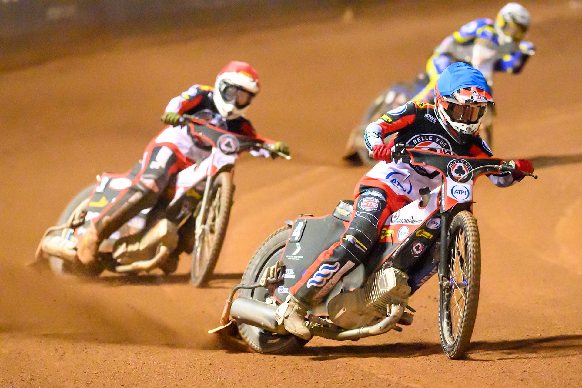 Zach Cook of Belle Vue Aces   in Blue leading Peter Kildemand of Belle Vue Aces   in Red and Josh Pickering of Sheffield Tigers    in White during the Knockout Cup, Northern Section match between Belle Vue Aces and Sheffield Tigers at the National Speedway Stadium, Manchester on Monday 30th March 2026. (Photo: Ian Charles | MI News)