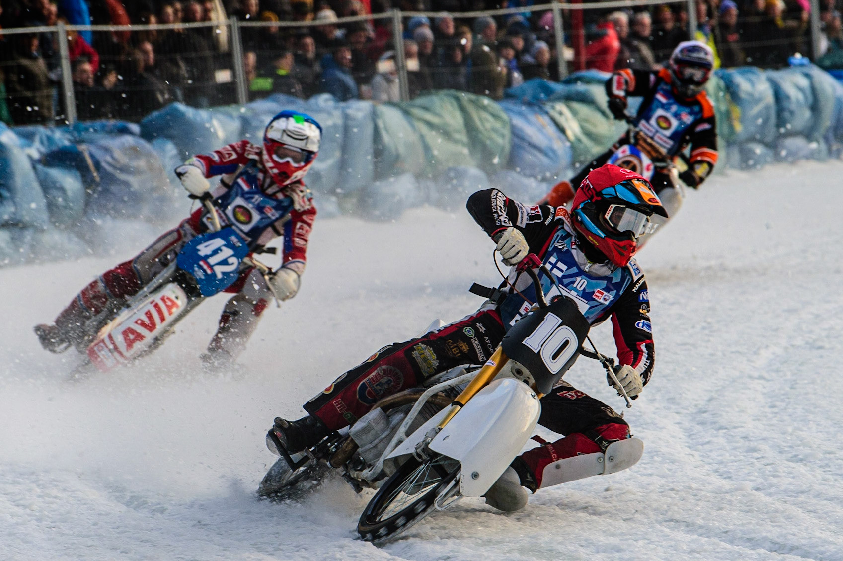 Topi Mustonen (Red) leads Niek Schaap (Blue) and Sebastian Reitsma (White) during the German Individual Ice Speedway Championship at Horst-Dohm-Eisstadion, Berlin on Friday 3rd March 2023. (Photo: Ian Charles | MI News)