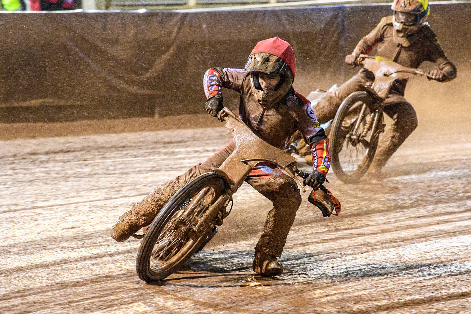 Ben Cook of Belle Vue Aces rides without his goggles ahead of Joe Thompson of Leicester Lions during the Rowe Motor Oil Premiership match between Belle Vue Aces and Leicester Lions at the National Speedway Stadium, Manchester on Saturday 6th April 2024. (Photo: Ian Charles | MI News)