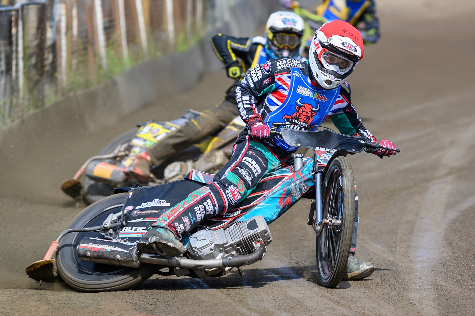 Alfie Bowtell of Buxton Bulls in Red leading Dayle Wood of Edinburgh Monarchs Academy in White during the WSRA National Development League match between Buxton Bulls and Edinburgh Monarchs Academy at Hi-Edge Speedway, Buxton on Sunday 14th June 2026. (Photo: Ian Charles | MI News)