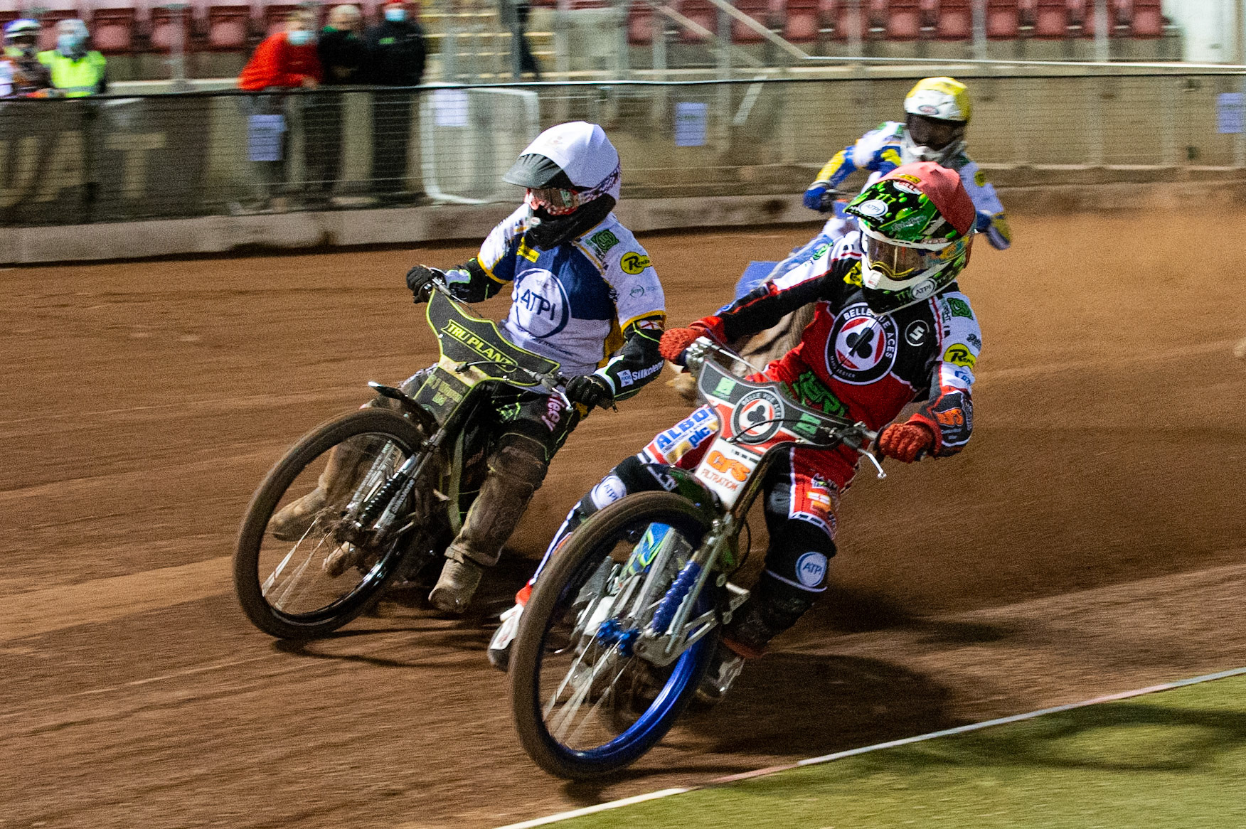 Photo: Ian CharlesDan Bewley of Belle Vue 'BikeRight' Aces  (Red) inside Danny King of the 'ATPI' All Stars  (White) with Lewis Kerr of the 'ATPI' All Stars (Yellow) behindBelle Vue ‘Bikerite ’Aces v ‘ATPI’ All Stars, Premiership Challenge, National Speedway Stadium, Manchester Thursday  24  September  2020