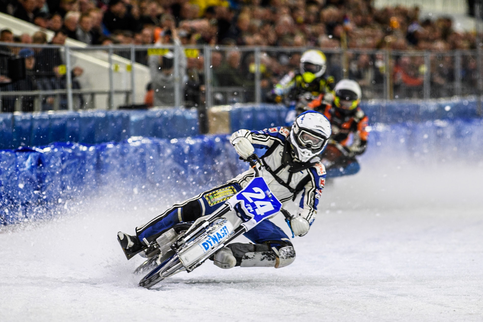 Max Koivula (24) of Finland in Blue leading Lukas Hutla (212) of the Czech Republic in White and \Max Niedermaier  (88) of Germany in Yellow during the FIM Ice Speedway Gladiators World Championship, Final 3 at the Ice Stadium, Thialf, Heerenveen on Saturday 5th April 2025. (Photo: Ian Charles | MI News)