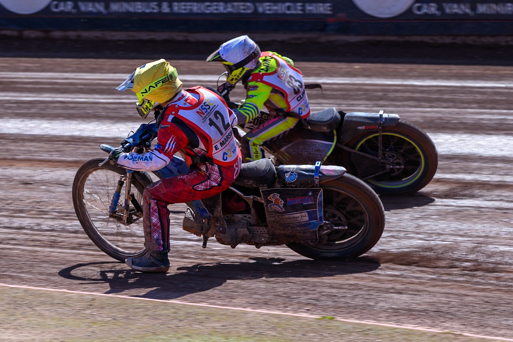 BRITISH YOUTH CHAMPIONSHIP 125cc Ella Marshall (12) in Yellow on the inside of George Climo (83) in White during the British Youth Championship (125cc) at the National Speedway Stadium, Manchester on Sunday 19th July 2026. (Photo: Ian Charles | MI News)