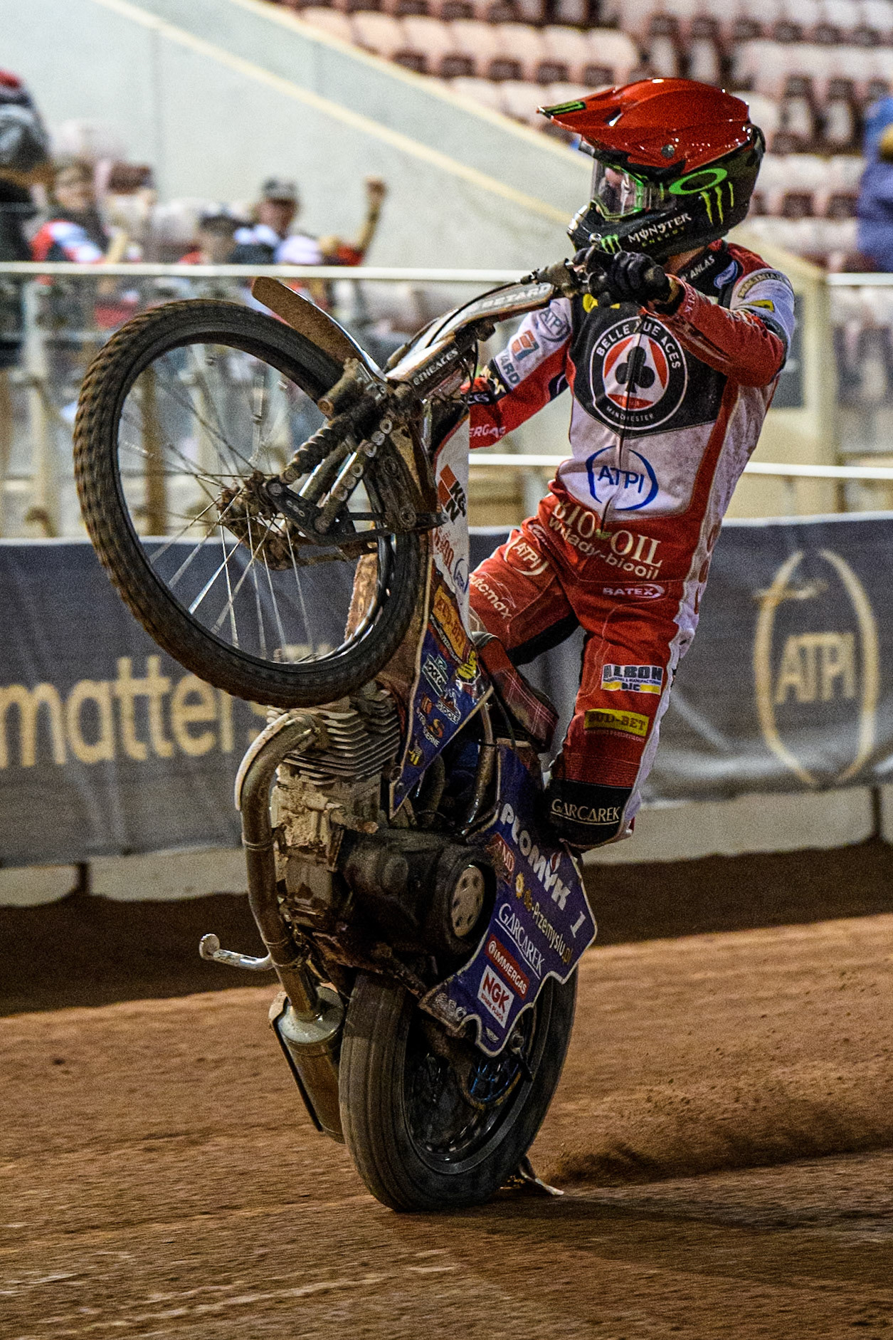 Belle Vue Aces' Dan Bewley  celebrates with a wheelie during the Rowe Motor Oil Premiership match between Belle Vue Aces and King's Lynn Stars at the National Speedway Stadium, Manchester on Monday 12th August 2024. (Photo: Ian Charles | MI News)