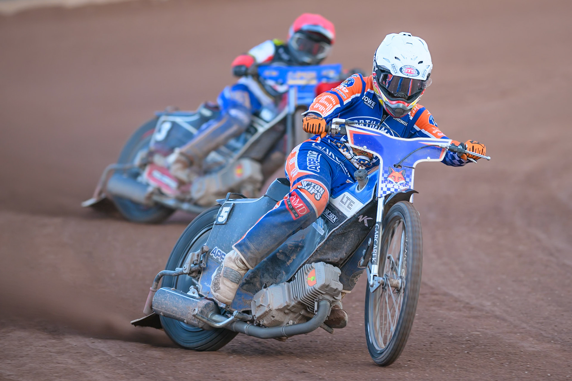 Nicolai Klindt of Northampton Foxes in White leading Ben Cook, Guest Rider for Belle Vue Aces in Red during the Rowe Motor Oil Premiership match between Belle Vue Aces and Northampton Foxes at the National Speedway Stadium, Manchester on Monday 13th July 2026. (Photo: Ian Charles | MI News)