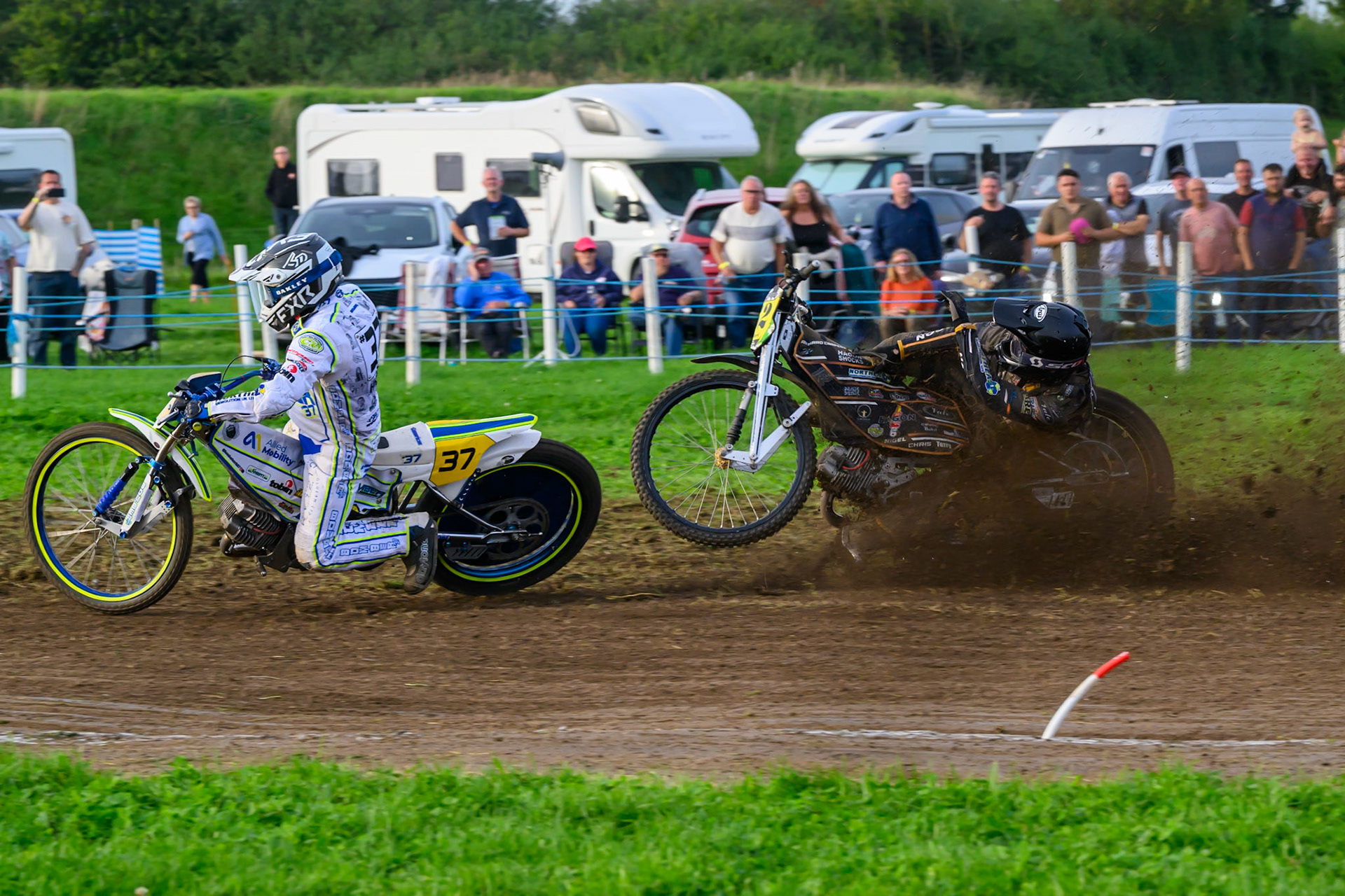British Masters (Solos): Ashton Vale (152) catches the back wheel of Chris Harris (37)  and comes off during the British Masters Grasstrack Championship at Lower Marsh Farm, Much Hoole, Preston in Lancashire, England on Sunday 13th September 2026. (Photo: Ian Charles | MI News)