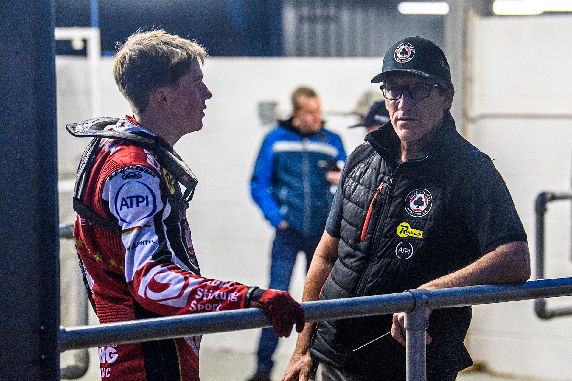Norick Blodorn (Left) chats with Belle Vue Team Manager Mark Lemon during the Sports Insure Premiership match between Belle Vue Aces and King's Lynn Stars at the National Speedway Stadium, Manchester on Monday 21st August 2023. (Photo: Ian Charles | MI News)