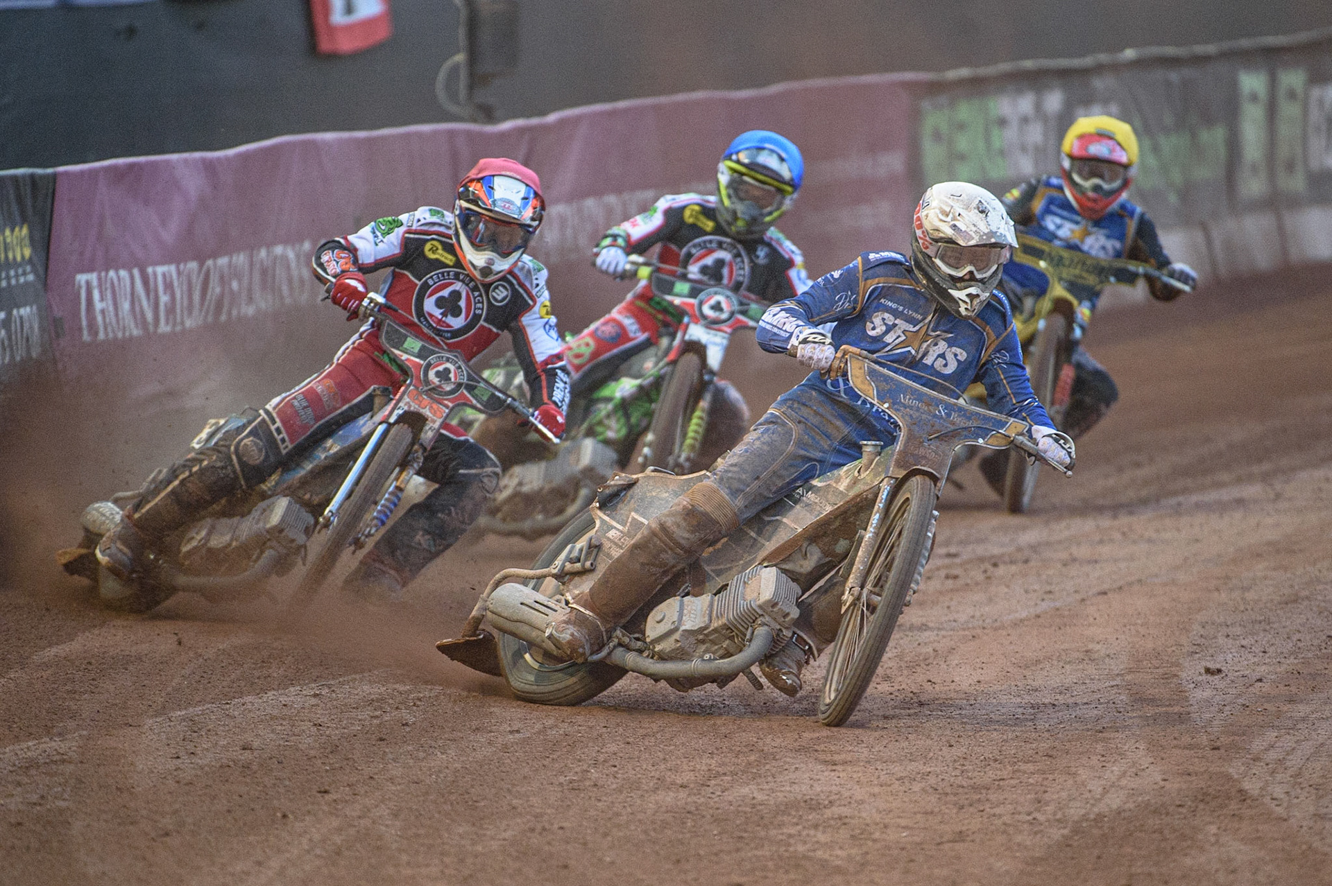 MANCHESTER, UK. AUGUST 23RD    Richard Lawson  (White) leads Steve Worrall  (Red) Charles Wright  (Blue) and Ben Barker  (Yellow) during the SGB Premiership match between Belle Vue Aces and King's Lynn Stars at the National Speedway Stadium, Manchester on Monday 23rd August 2021. (Credit: Ian Charles | MI News)