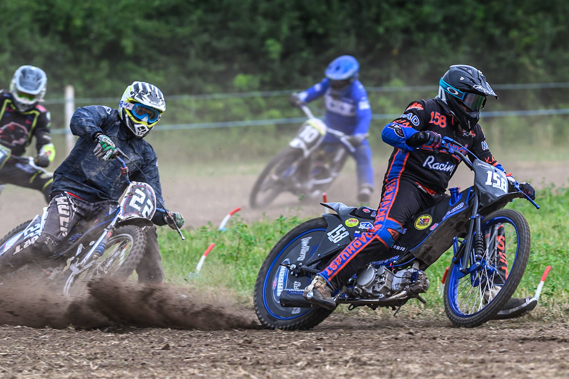 Wayne Broadhurst (158) leading Phil Thomas (22) in the GT140 Class during the ACU Northern Grass Track Riders Championship at Cheshire Grass Track Club, Frog Lane, Knutsford, Cheshire on Sunday 20th July 2025. (Photo: Ian Charles | MI News)