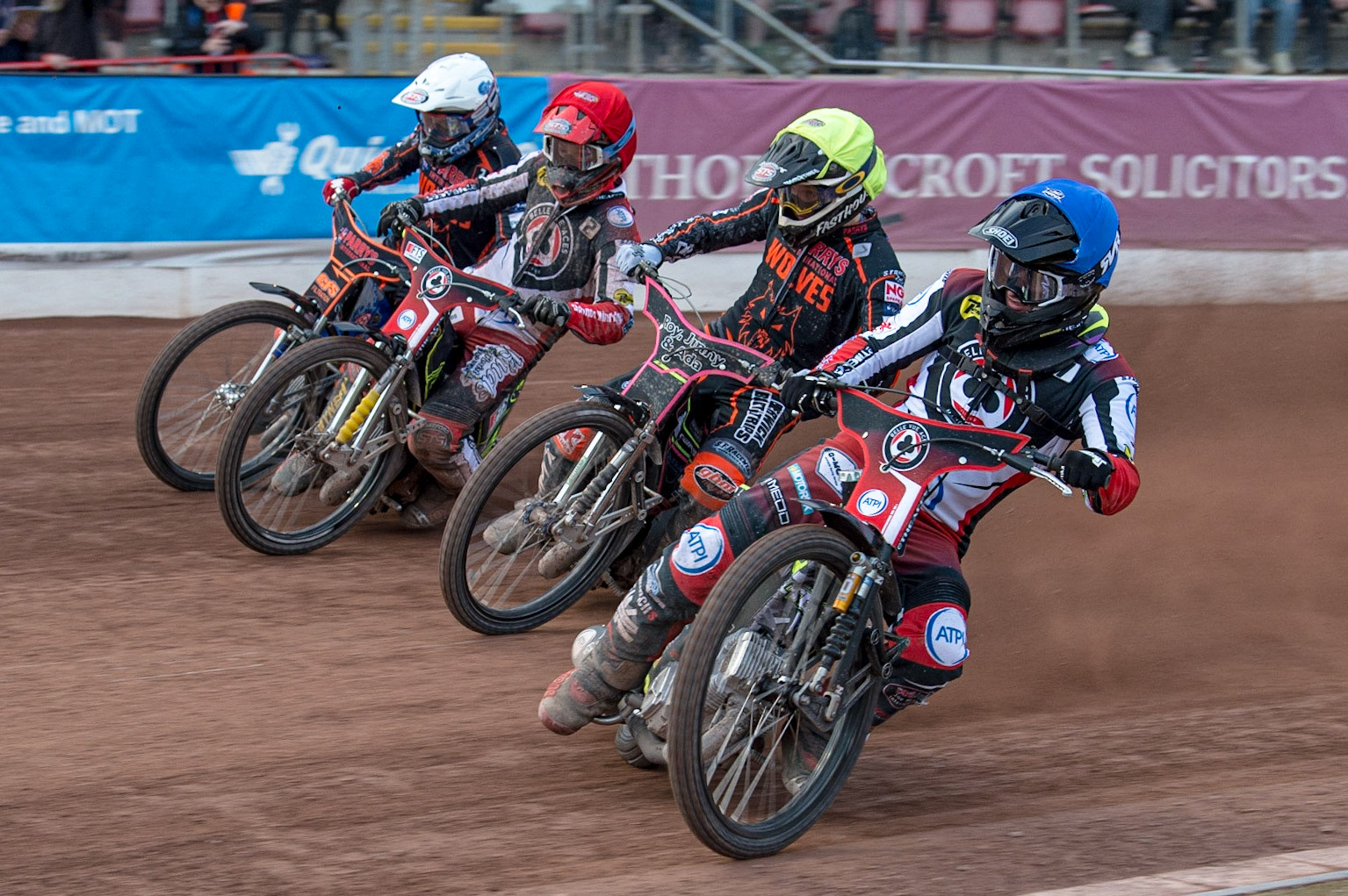 MANCHESTER, UK. JUN 13TH Tom Brennan  (Blue) inside Leon Flint  (Yellow), Jye Etheridge  (Red) and Steve Worrall  (White) during the SGB Premiership match between Belle Vue Aces and Wolverhampton  Wolves at the National Speedway Stadium, Manchester on Monday 13th June 2022. (Credit: Ian Charles | MI News)