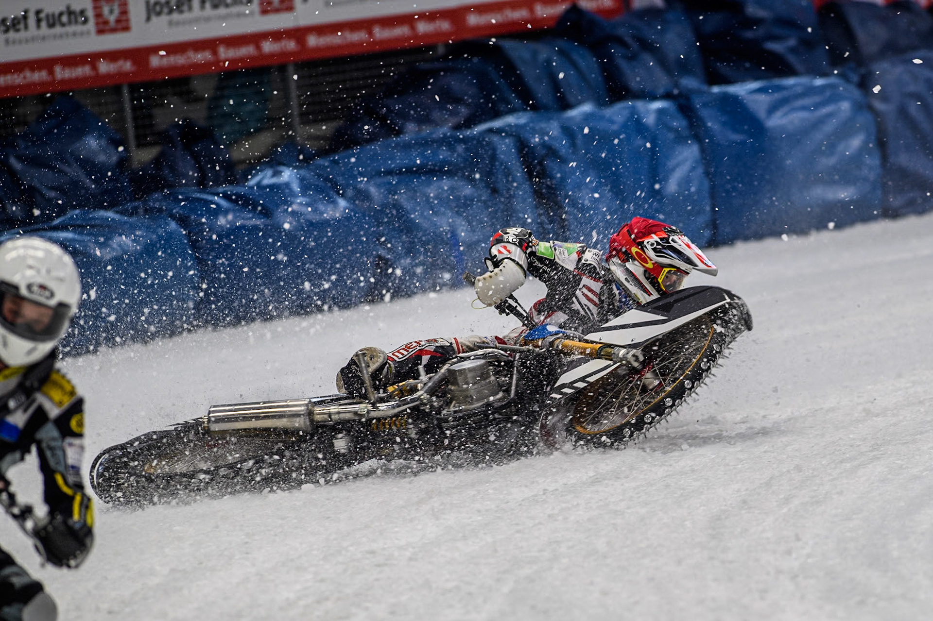 Austria's Charly Ebner (665) spins off during the FIM Ice Speedway Gladiators World Championship Final 2 at the Max-Aicher-Arena, Inzell on Sunday 24 March 2024. (Photo: Ian Charles | MI News)