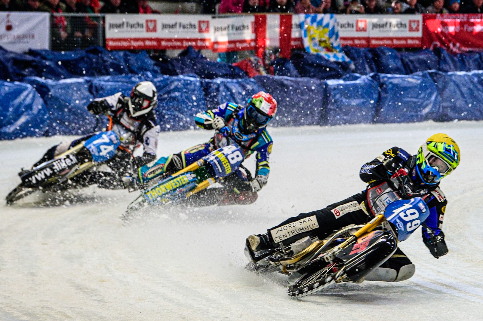 Martin Haarahiltunen (199) (Yellow) leads Luca Bauer (48) (Red) and Mats Järf (74) (White)  during the Ice Speedway Gladiators World Championship Final 2 at Max-Aicher-Arena, Inzell, Germany on Sunday 19th March 2023. (Photo: Ian Charles | MI News)
