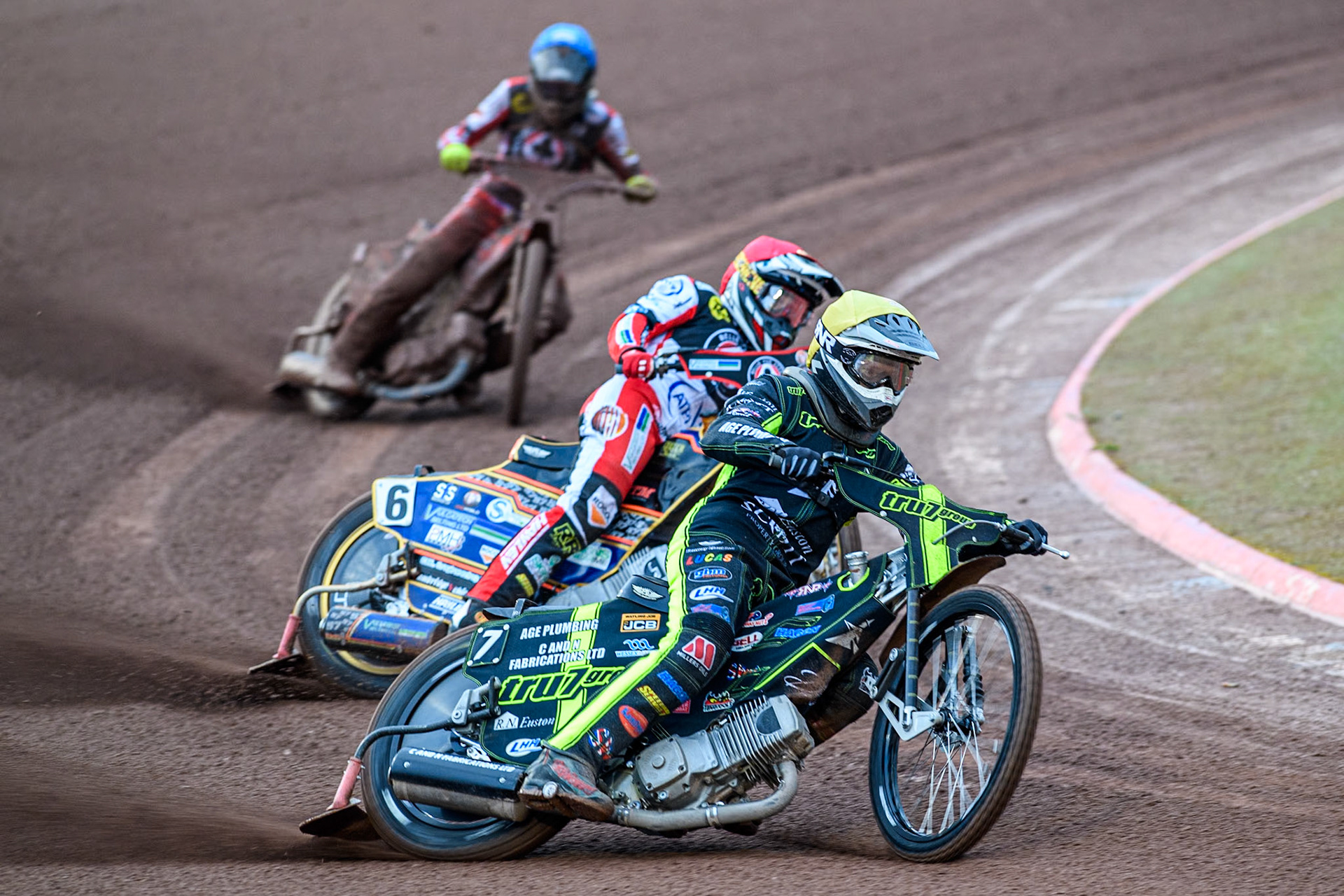 Ipswich Witches' Dan Thompson in Yellow leading Belle Vue Aces' Connor Mountain in Red and Belle Vue Aces' Connor Bailey in Blue during the Rowe Motor Oil Premiership match between Belle Vue Aces and Ipswich Witches at the National Speedway Stadium, Manchester on Monday 22nd April 2024. (Photo: Ian Charles | MI News)