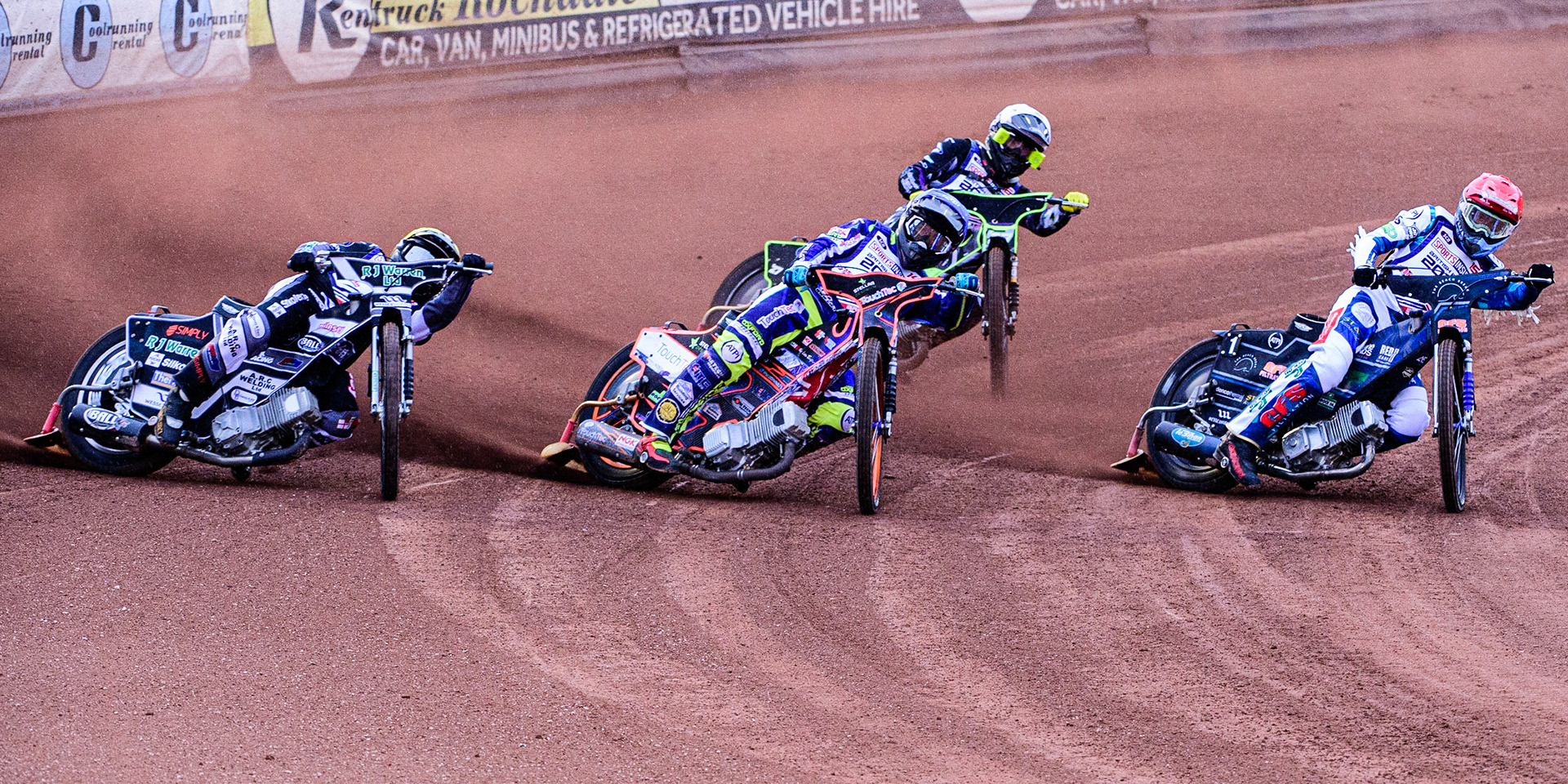 Adam Ellis  (Red) inside Scott Nicholls  (Blue) and Danny King  (Yellow) with Tom Brennan (White) behind during the Sports Insure British Speedway Championship Final at the National Speedway Stadium, Bellevue, Manchester, England on Monday 1st August 2022. (Photo by: Ian Charles | MI News)