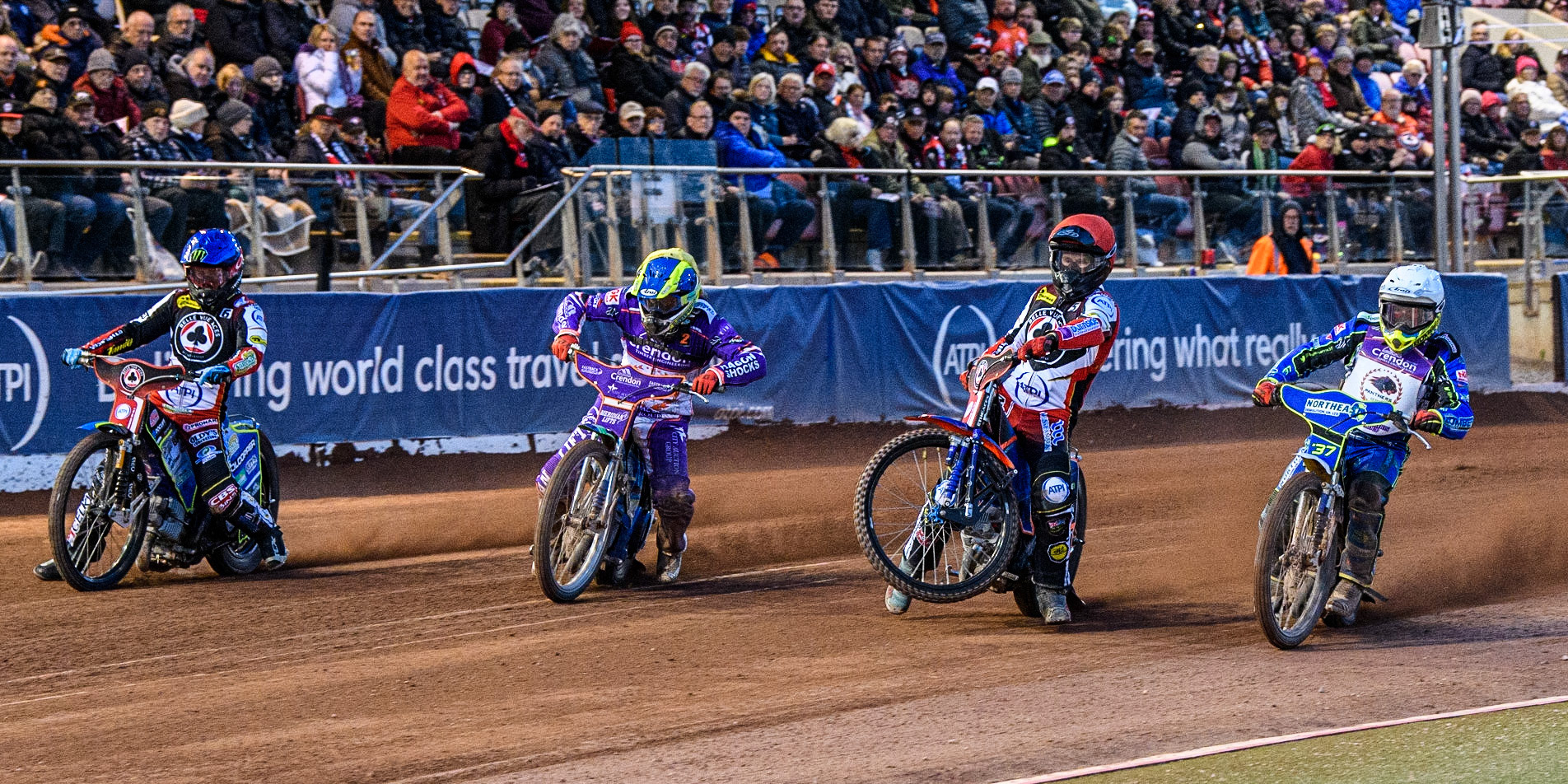 (l - r) Jaimon Lidsey  (Blue) Hans Andersen  (Yellow), Brady Kurtz  (Red) (picking up some drive) and Chris Harris  (White) during the SGB Premiership match between Belle Vue Aces and Peterborough at the National Speedway Stadium, Manchester on Monday 24th April 2023. (Photo: Ian Charles | MI News)