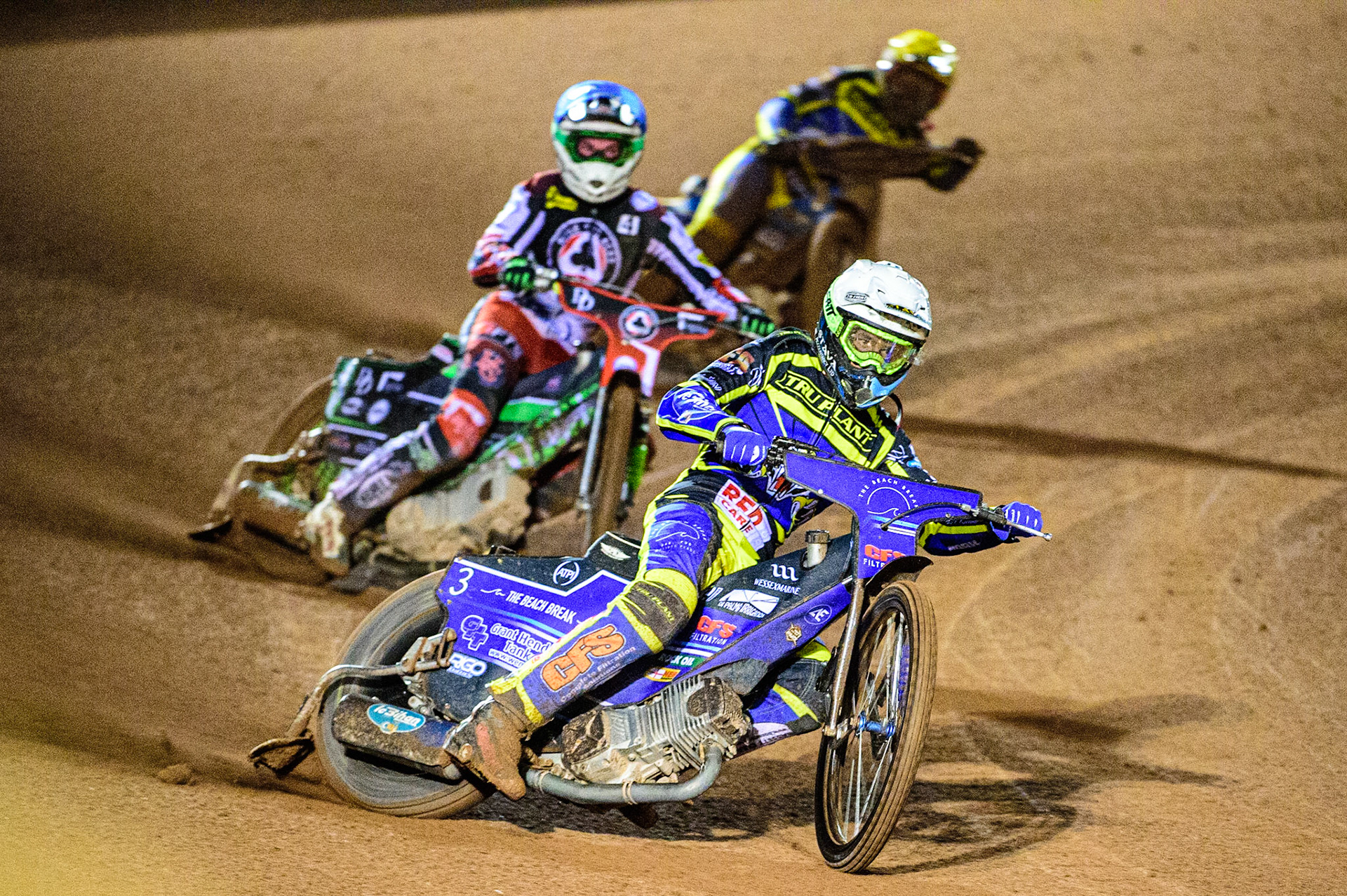 Adam Ellis  (White) leads Charles Wright  (Blue) and Kyle Howarth  (Yellow) during the SGB Premiership Grand Final 1st leg between Belle Vue Aces and Sheffield Tigers at the National Speedway Stadium, Manchester on Monday 10th October 2022. (Credit: Ian Charles | MI News)
