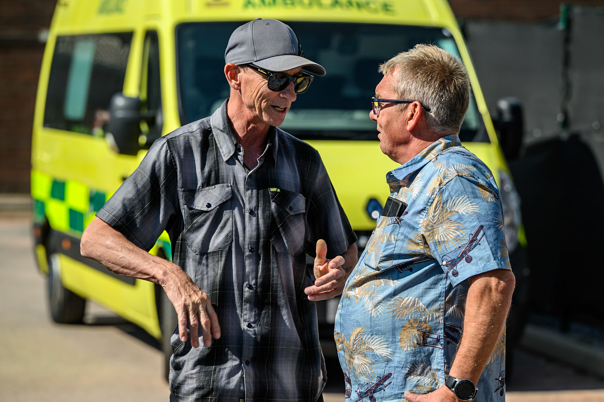 Former riders Shane Parker (Left) and Carl Stonehewer catch up on old times during the Rowe Motor Oil Premiership match between Belle Vue Aces and Sheffield Tigers at the National Speedway Stadium, Manchester on Monday 25th August 2025. (Photo: Ian Charles | MI News)