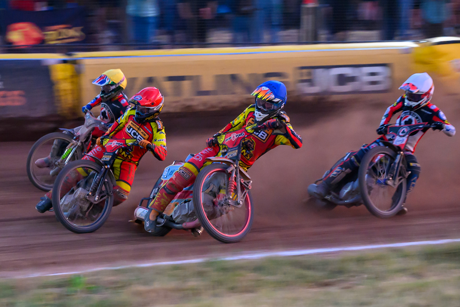 Drew Kemp of Leicester Lions  in Blue rides inside Kyle Howarth of Leicester Lions  in Red and Will Cairns of Belle Vue Aces in Yellow  with Zach Cook of Belle Vue Aces  behind during the Rowe Motor Oil Premiership match between Leicester Lions and Belle Vue Aces at the Hydroscan Arena, Leicester on Thursday 23rd July 2026. (Photo: Ian Charles | MI News)