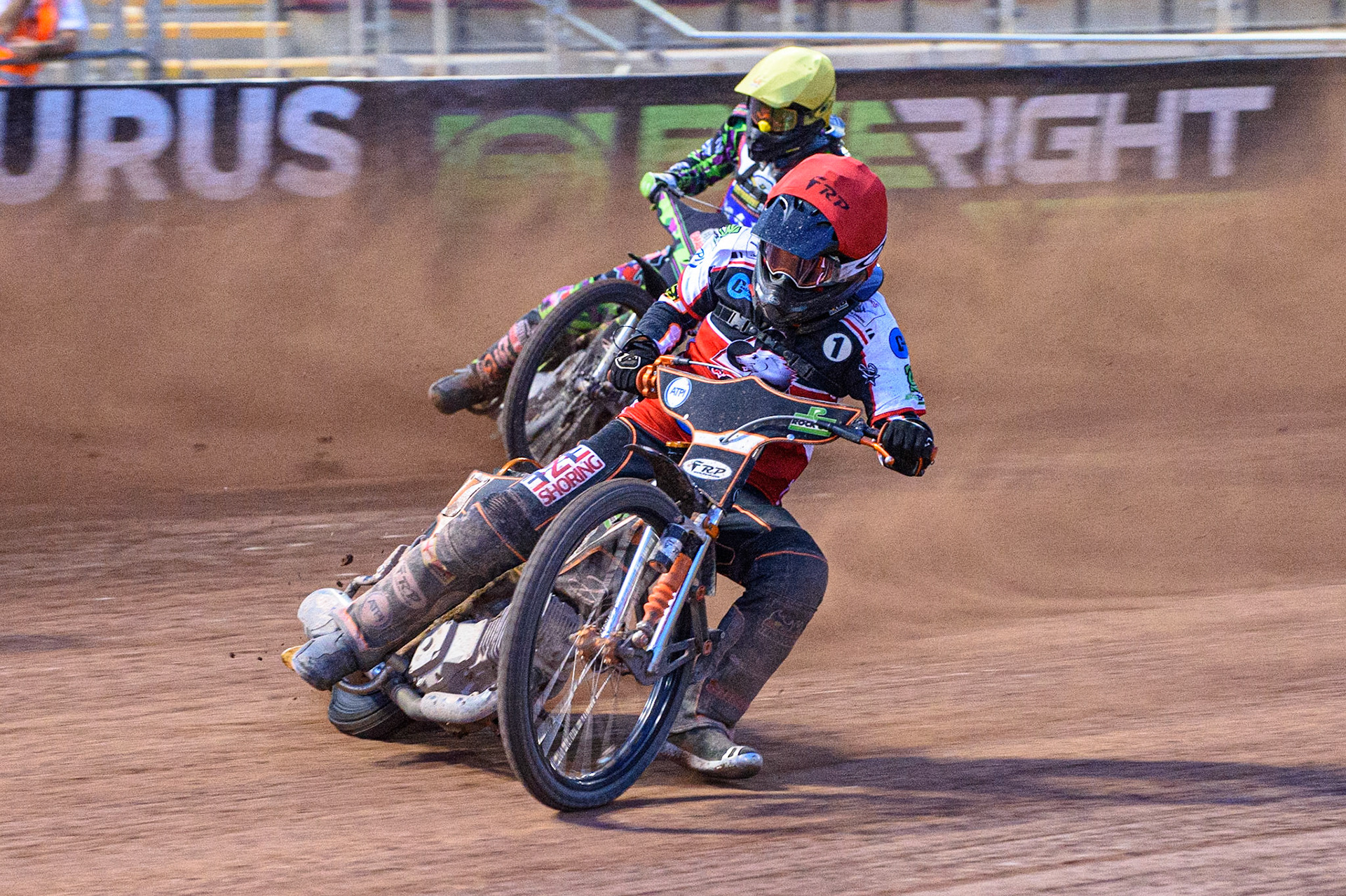 MANCHESTER, UK. JULY 23RD Jack Smith  (Red) leads Richard Andrews  (Yellow) during the National Development League match between Belle Vue Colts and Eastbourne Seagulls at the National Speedway Stadium, Manchester on Friday 23rd July 2021. (Credit: Ian Charles | MI News)