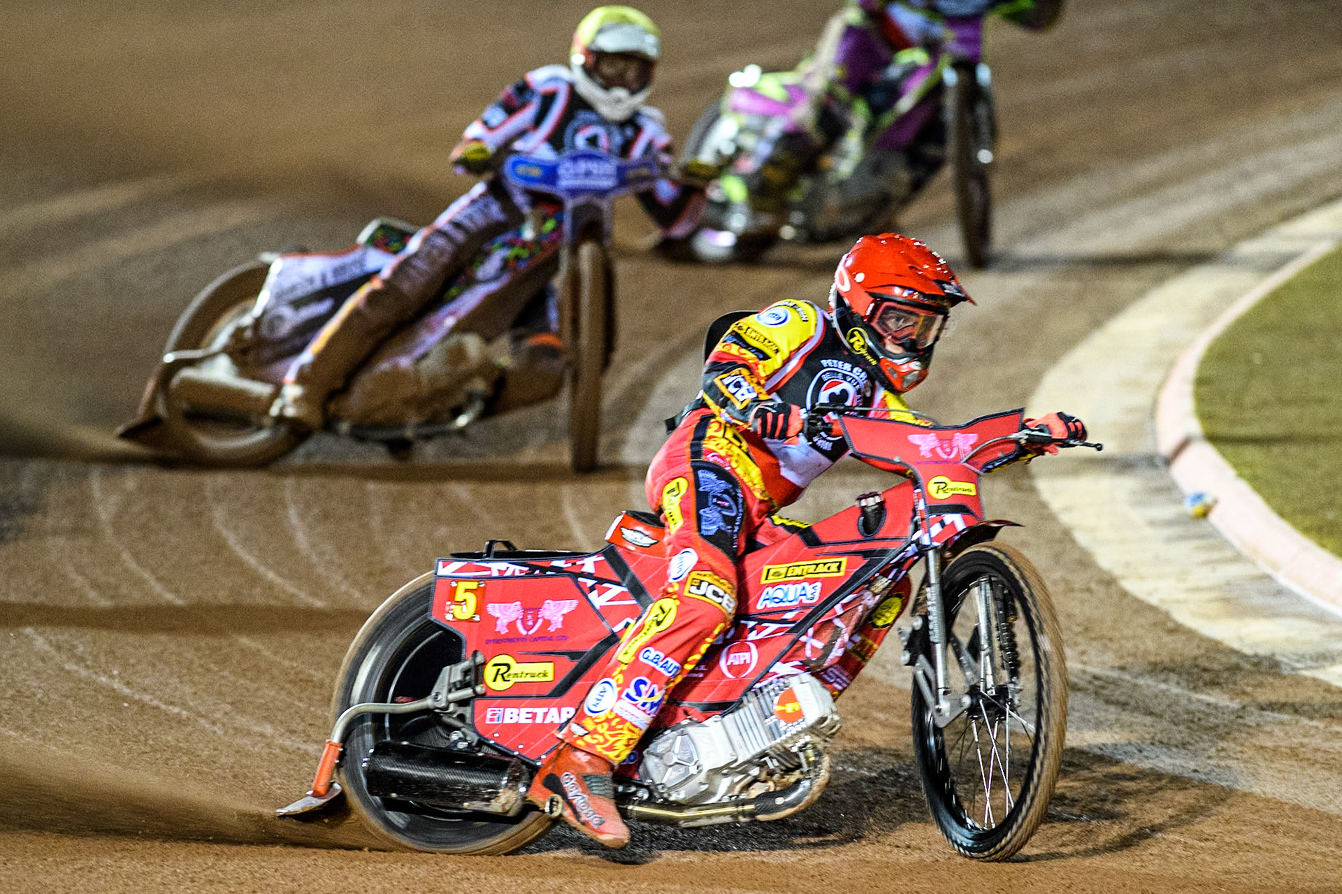 Australia's Max Fricke (Red) leads  Denmark's Niels-Kristian Iversen (Yellow) during the Peter Craven Memorial Trophy meeting at the National Speedway Stadium, Manchester on Monday 18th March 2024. (Photo: Ian Charles | MI News)