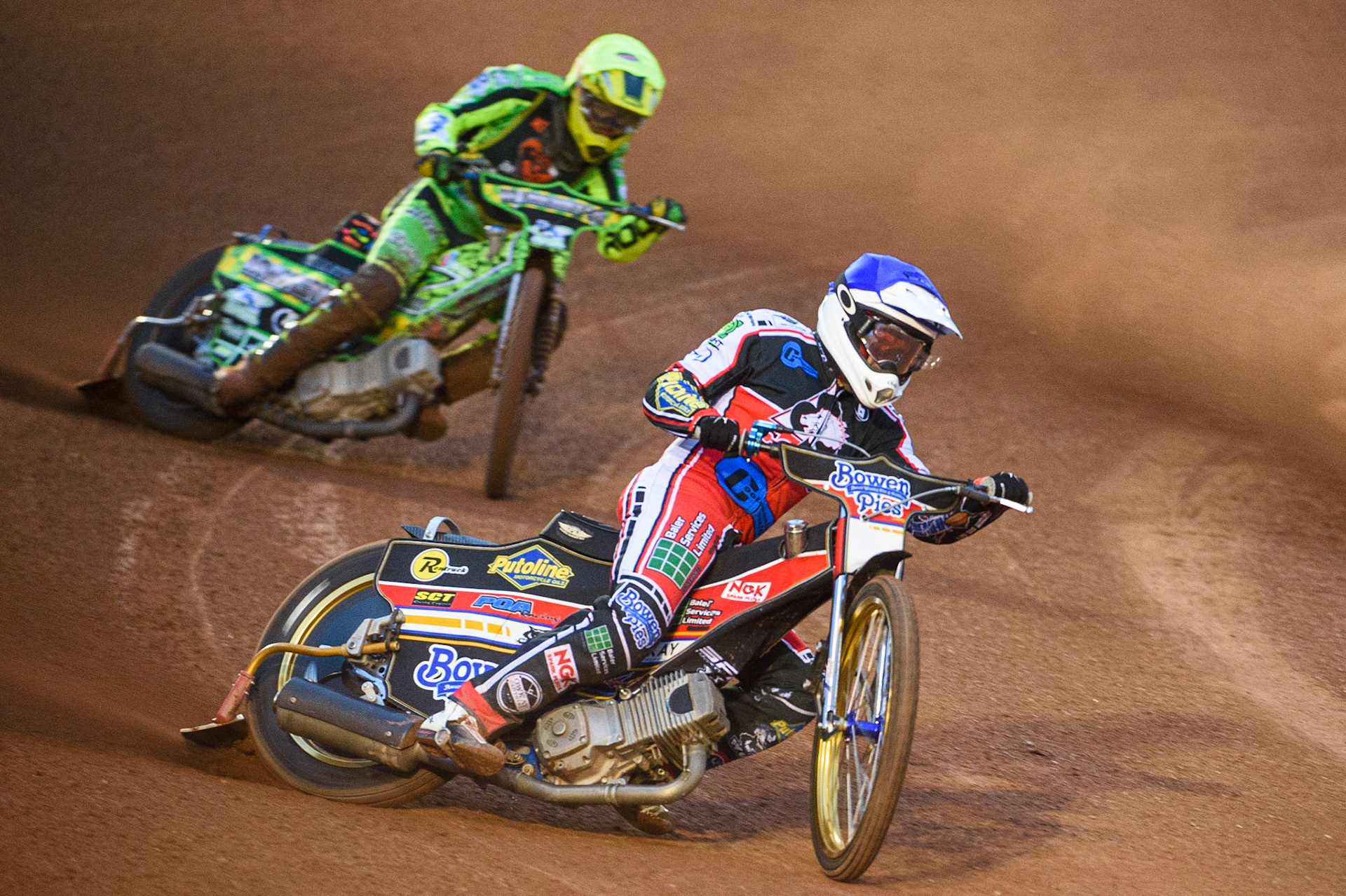 MANCHESTER, SEPT 3RD. Paul Bowen  (Blue) leads Sam Bebee  (Yellow) during the National Development League match between Belle Vue Aces and Mildenhall Fens Tigers at the National Speedway Stadium, Manchester on Friday 3rd September 2021. (Credit: Ian Charles | MI News)
