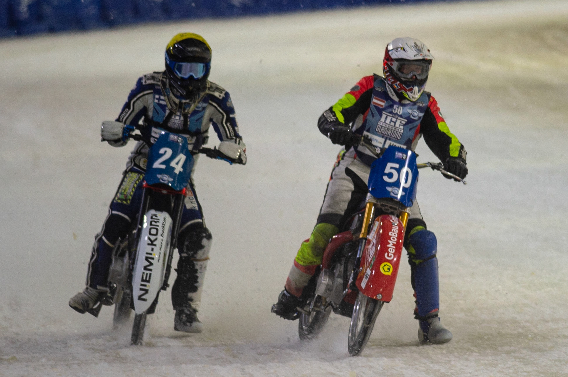 HEERENVEEN, NL.Harald Simon (50)’ (White) inside Max Koivula (24) (Yellow) during the FIM Ice Speedway Gladiators World Championship Final 3 at Ice Rink Thialf, Heerenveen on Saturday  2 April 2022. (Credit: Ian Charles | MI News)
