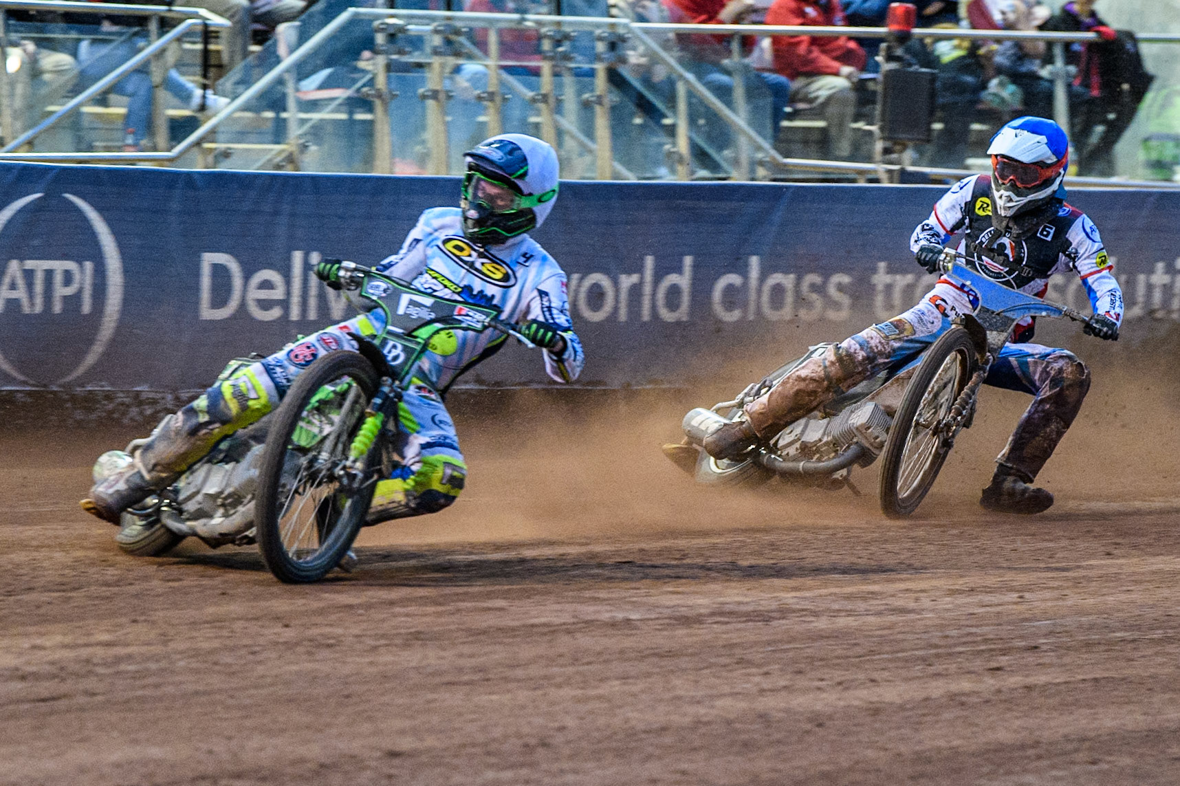 Oxford Spires' Charles Wright  in White leading Belle Vue Aces' guest Antti Vuolas  in Blue during the Rowe Motor Oil Premiership match between Belle Vue Aces and Oxford Spires at the National Speedway Stadium, Manchester on Monday 22nd July 2024. (Photo: Ian Charles | MI News)