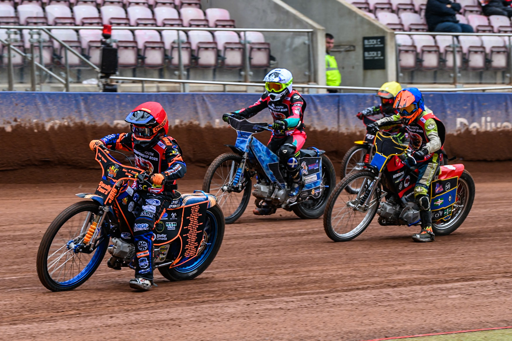 Support Class: Callum Hague (809) in Red leading Douglas Marshall (99) in Blue Ella Marshall (12) in White and Reggie Ball (27) in Yellow during the British Youth Championship (125cc) Round 2A, at the National Speedway Stadium, Manchester on Sunday 1st June 2025. (Photo: Ian Charles | MI News)