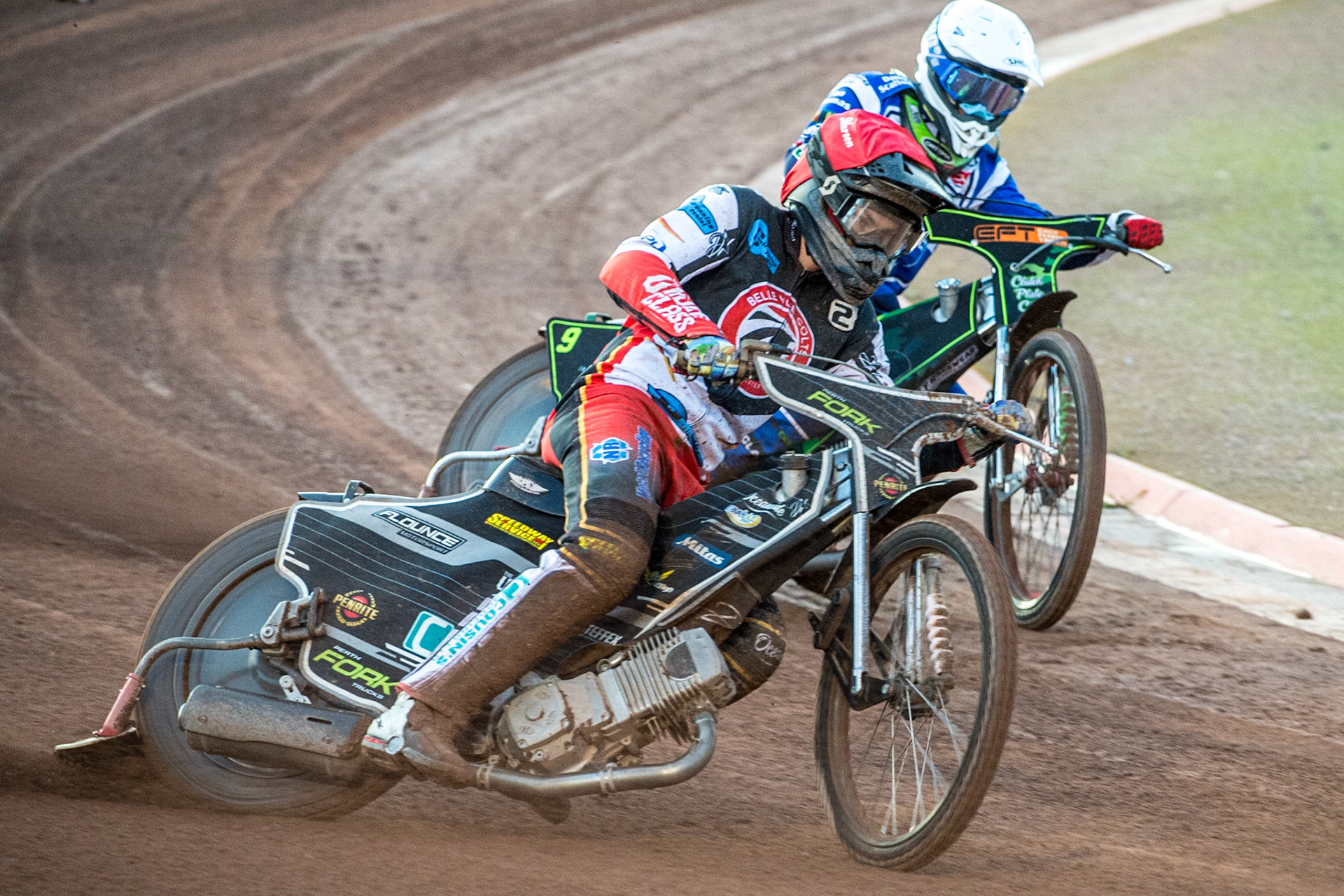 Matt Marson (Red) leads  Luke Harrison (White) during the National Development League match between Belle Vue Colts and Workington Comets at the National Speedway Stadium, Manchester on Friday 25th August 2023. (Photo: Ian Charles | MI News)