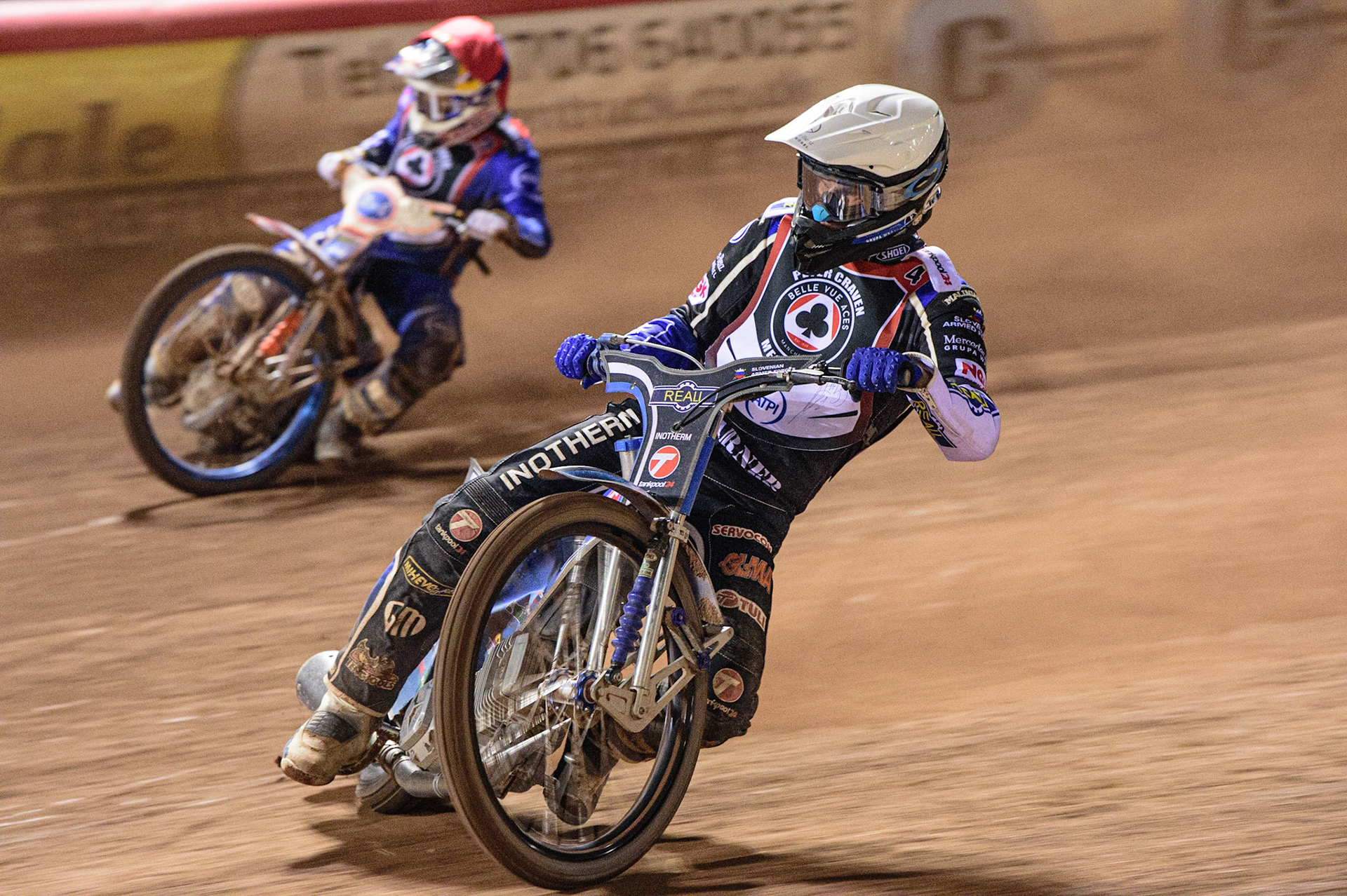 MANCHESTER, UK. MAR 21ST. Matej Žagar  (White) inside Robert Lambert (Red) during the ATPI Peter Craven Memorial Trophy at the National Speedway Stadium, Manchester on Monday 21st March 2022. (Credit: Ian Charles | MI News)