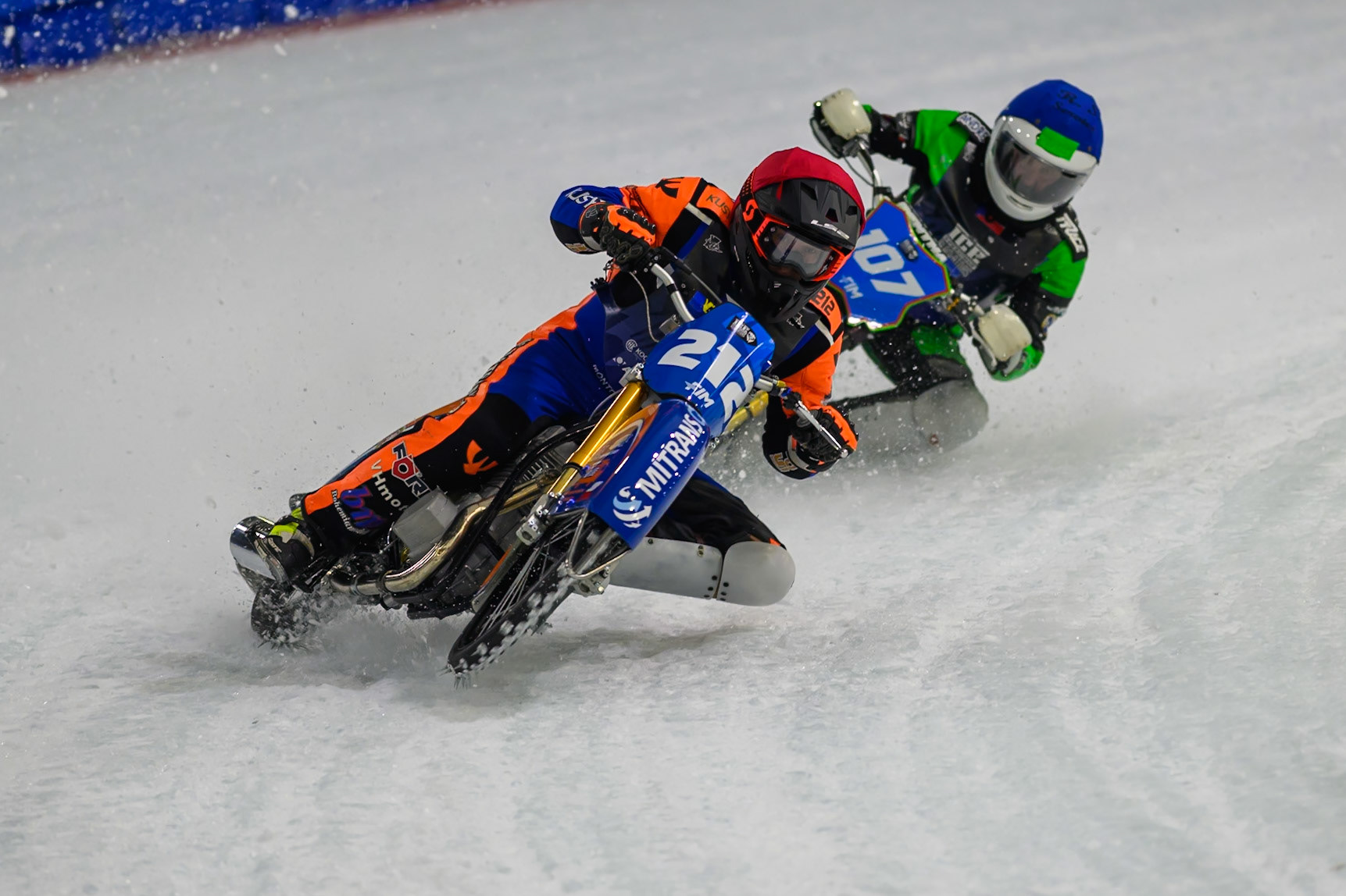 Lukas Hutla (212) of Czechia hits a rut in the ice in front of Andrej Divis (107) of Czechia in Blue during the FIM Ice Speedway Gladiators World Championship Final 3 at Ice Rink Thialf, Heerenveen on Saturday 11th April 2026. (Photo: Ian Charles | MI News)