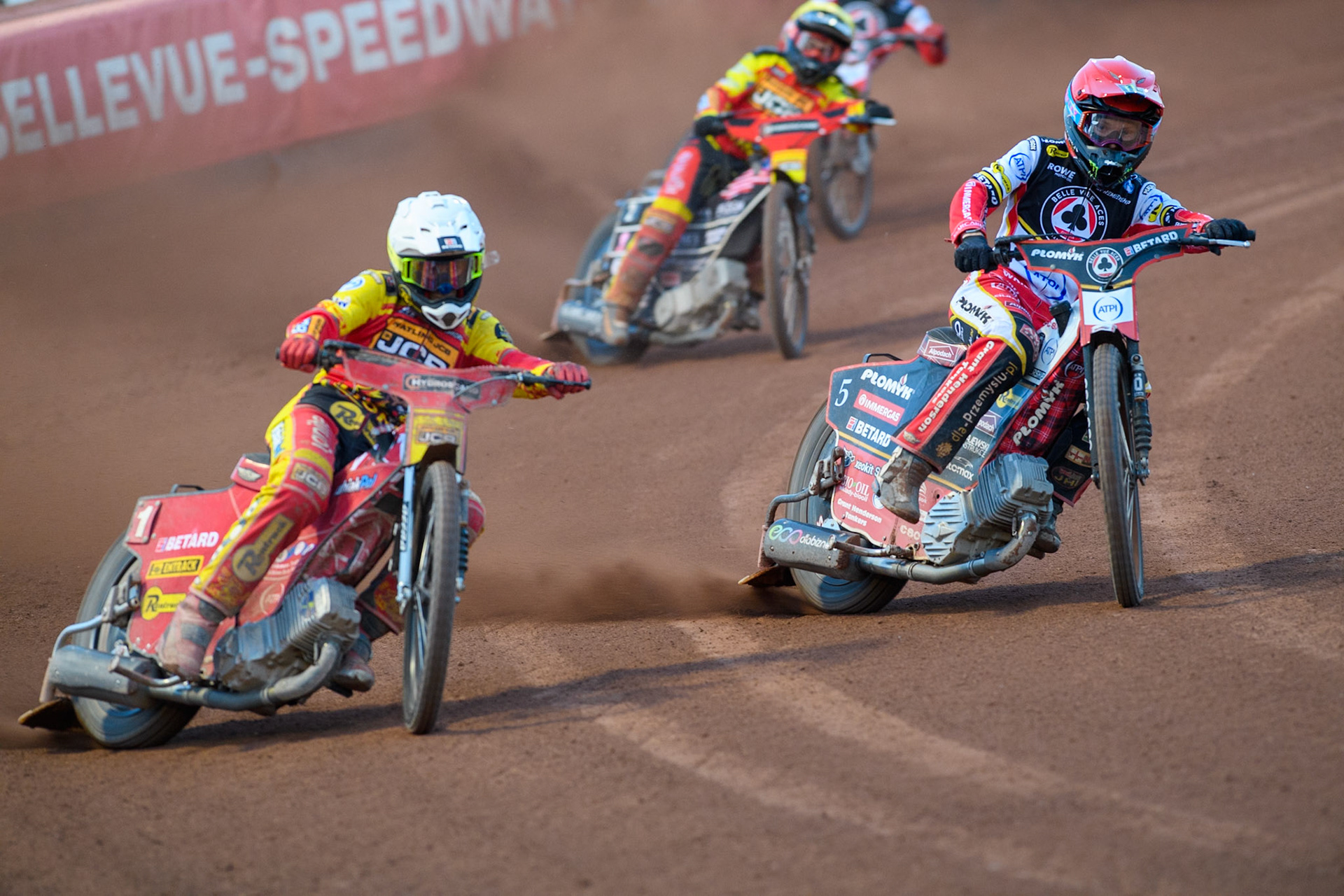 Belle Vue Aces' Dan Bewley in Red rides inside Leicester Lions' Max Fricke in White with Leicester Lions' Luke Becker in Yellow behind during the Rowe Motor Oil Premiership match between Belle Vue Aces and Leicester Lions at the National Speedway Stadium, Manchester on Monday 19th May 2025. (Photo: Ian Charles | MI News)