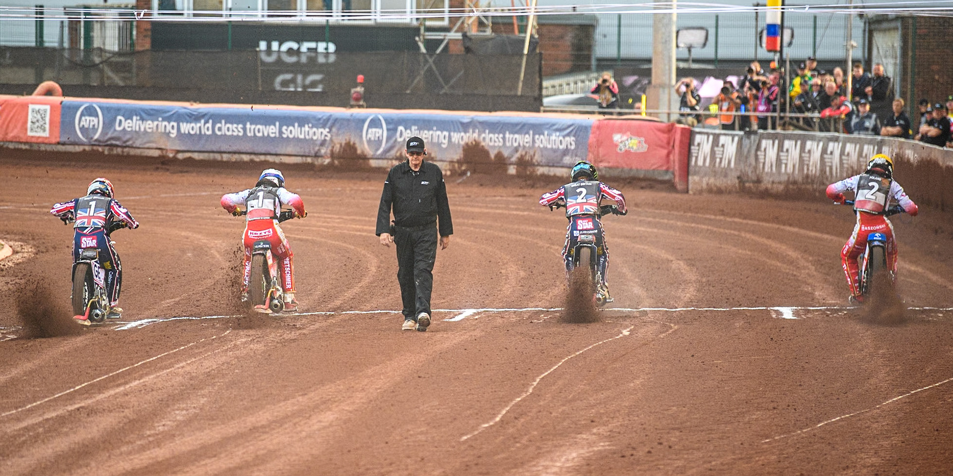 GREAT BRITAIN v POLAND: (L to R) Robert Lambert of Great Britain in Red, Dominik Kubera of Poland in White Dan Bewley of Great Britain in Blue and Bartosz Zmarzlik of Poland in Yellow leave the start during the Monster Energy FIM Speedway of Nation Final at the National Speedway Stadium, Manchester on Saturday 13th July 2024. (Photo: Ian Charles | MI News)