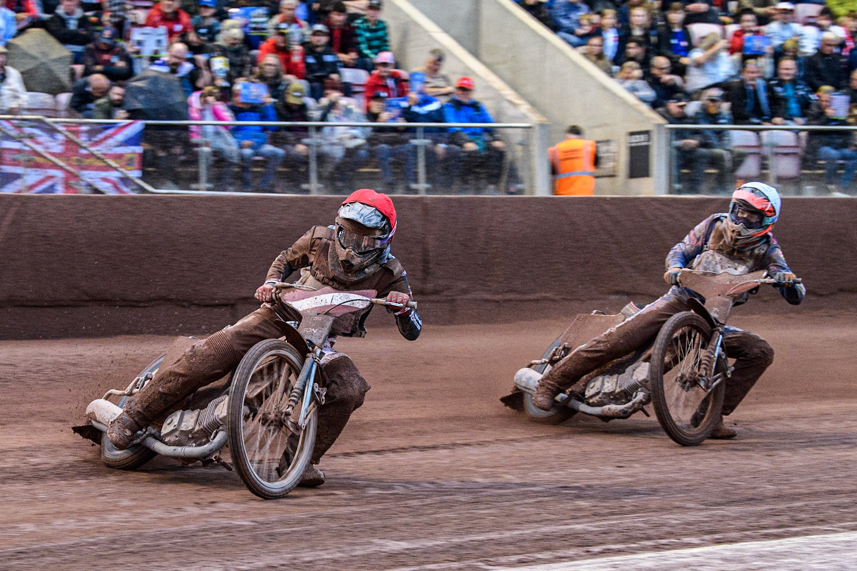 Artjoms Juhno of Latvia in Red leading Jan Jenicek of Czech Republic in White during the Monster Energy FIM Speedway of Nations 2 (Under 21) Final at the National Speedway Stadium, Manchester on Friday 12th July 2024. (Photo: Ian Charles | MI News)
